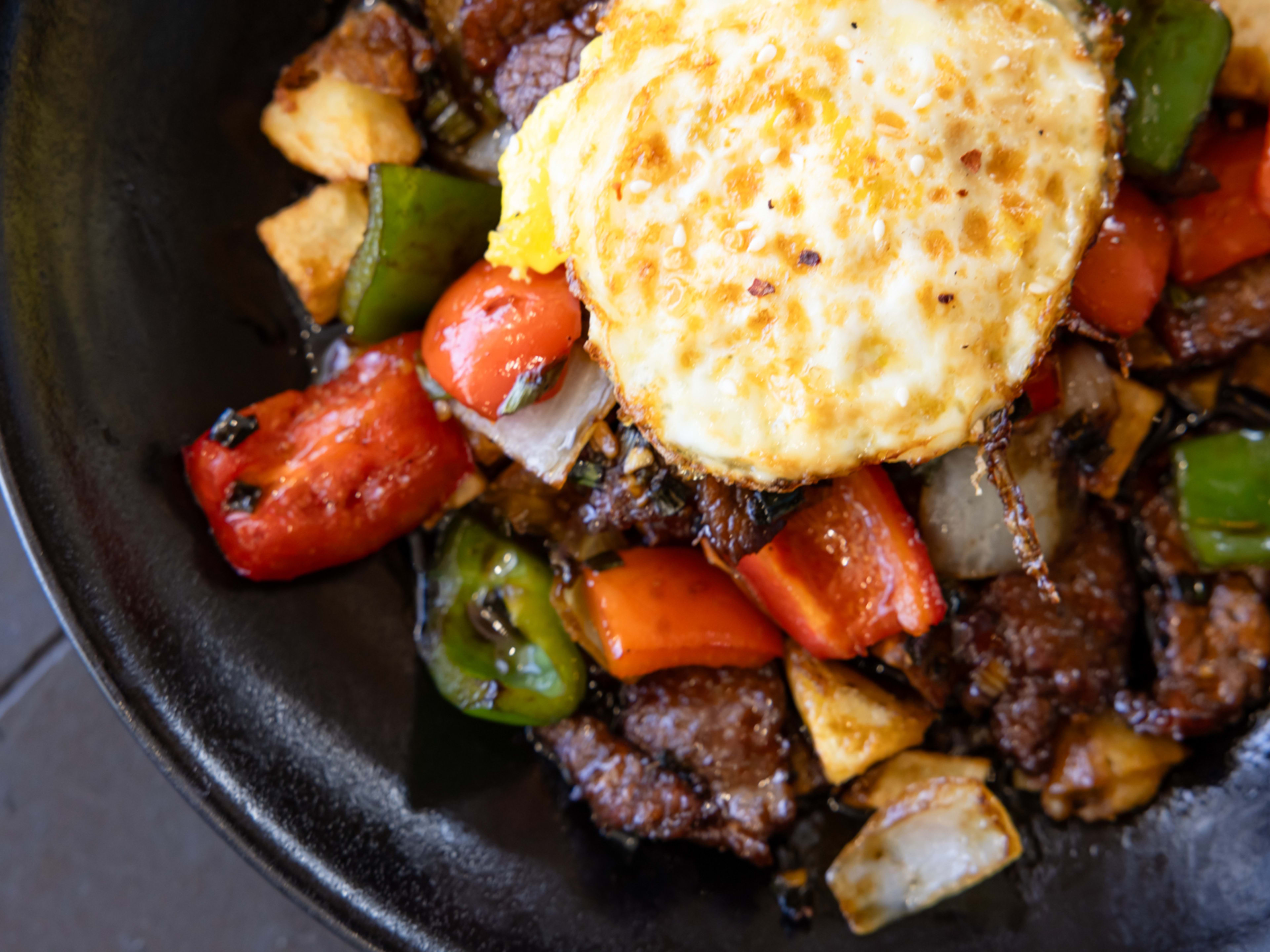 Mongolian beef hash with a fried egg