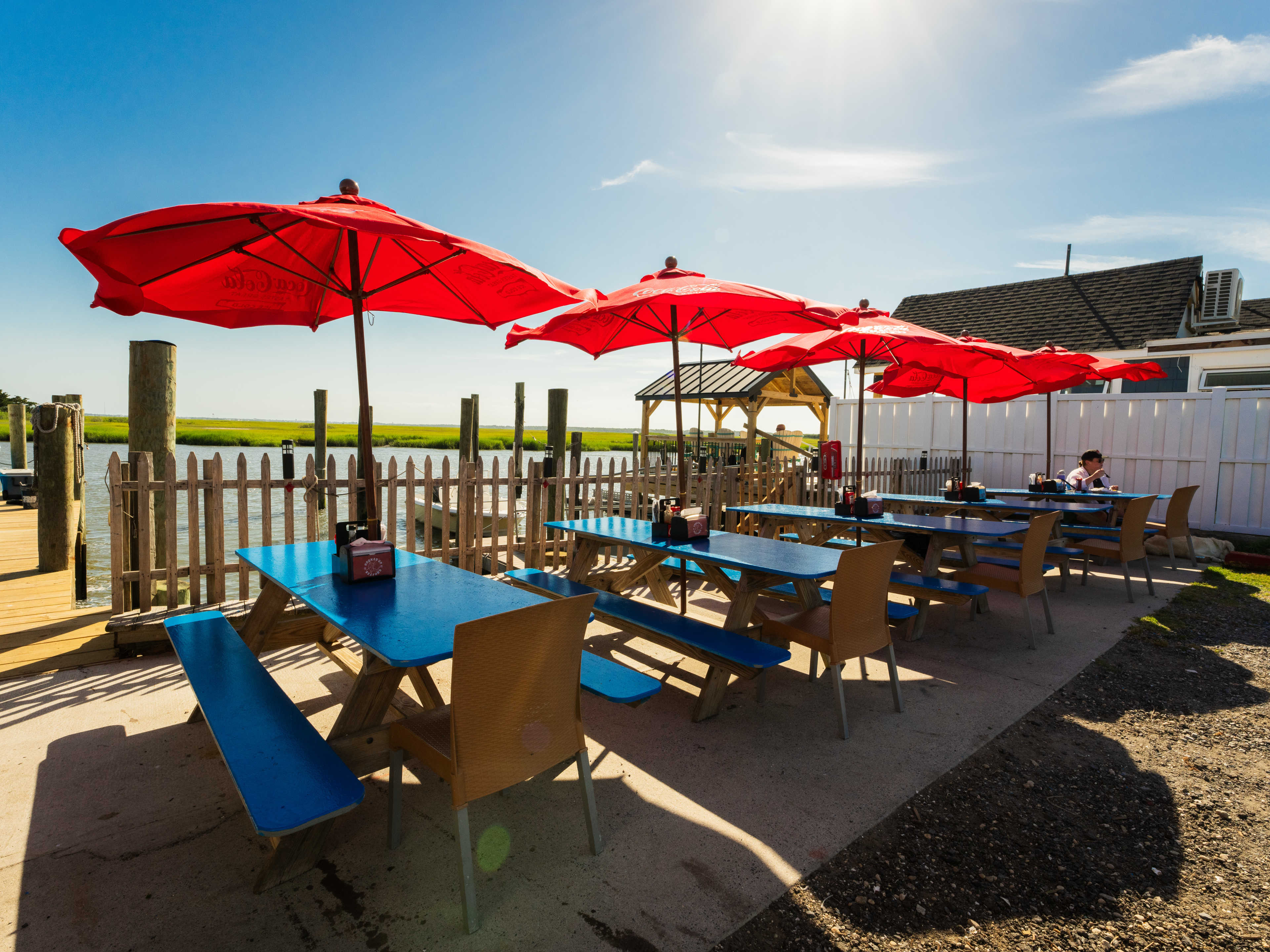 The blue and red exterior of Hooked Up Seafood in Cape May