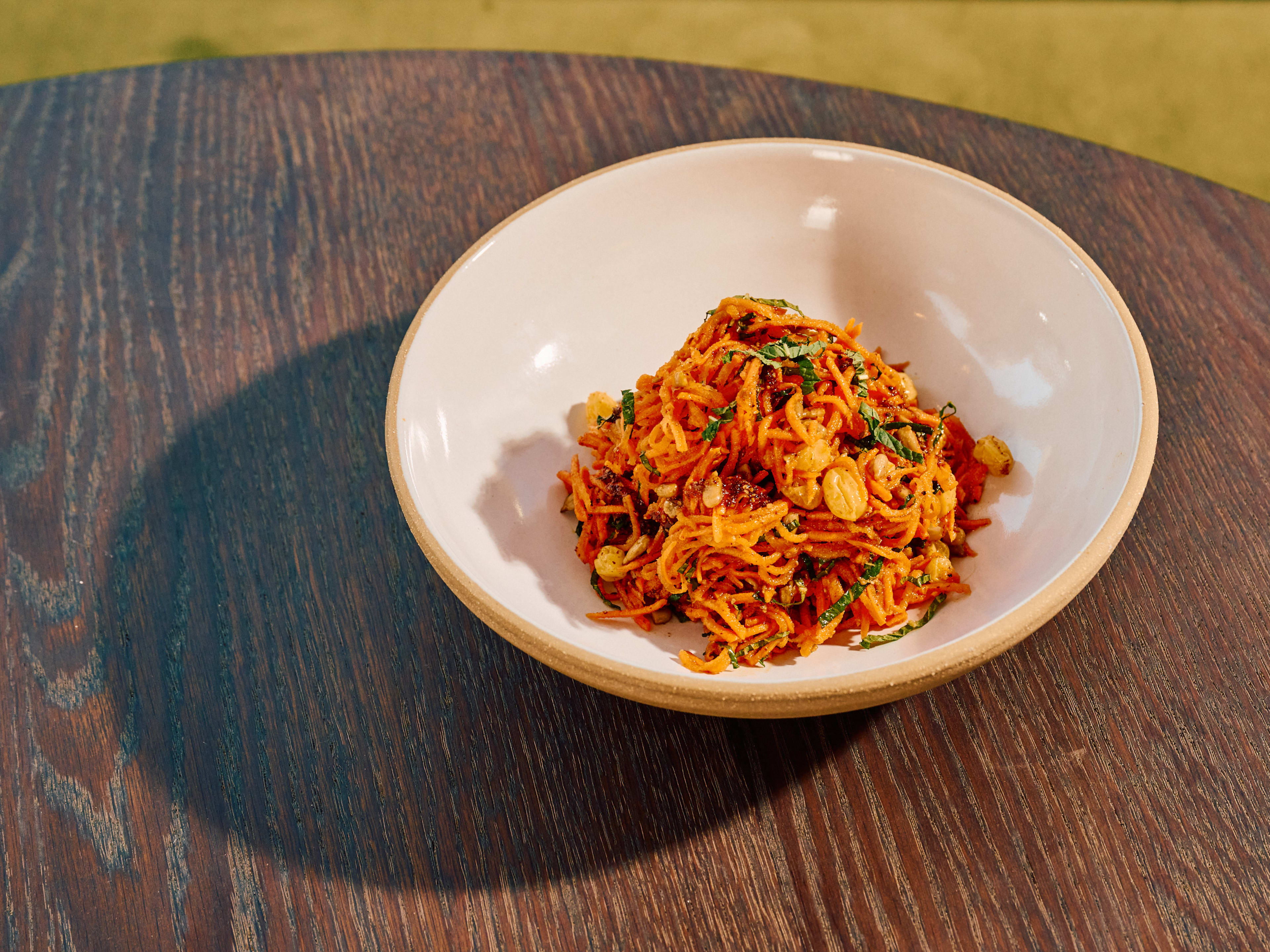 carrot salad with sunflower seeds and golden raisins