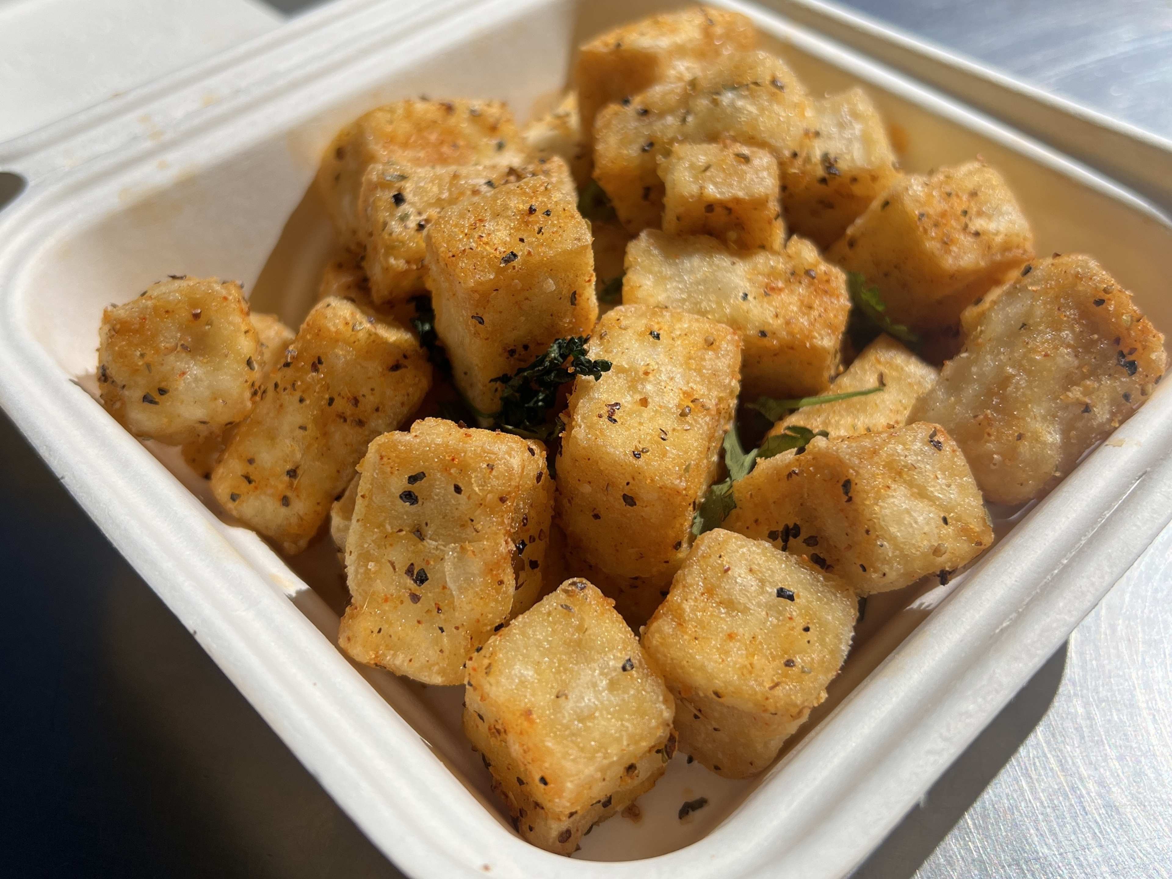 Fried tofu nuggets tossed in adobo seasoning