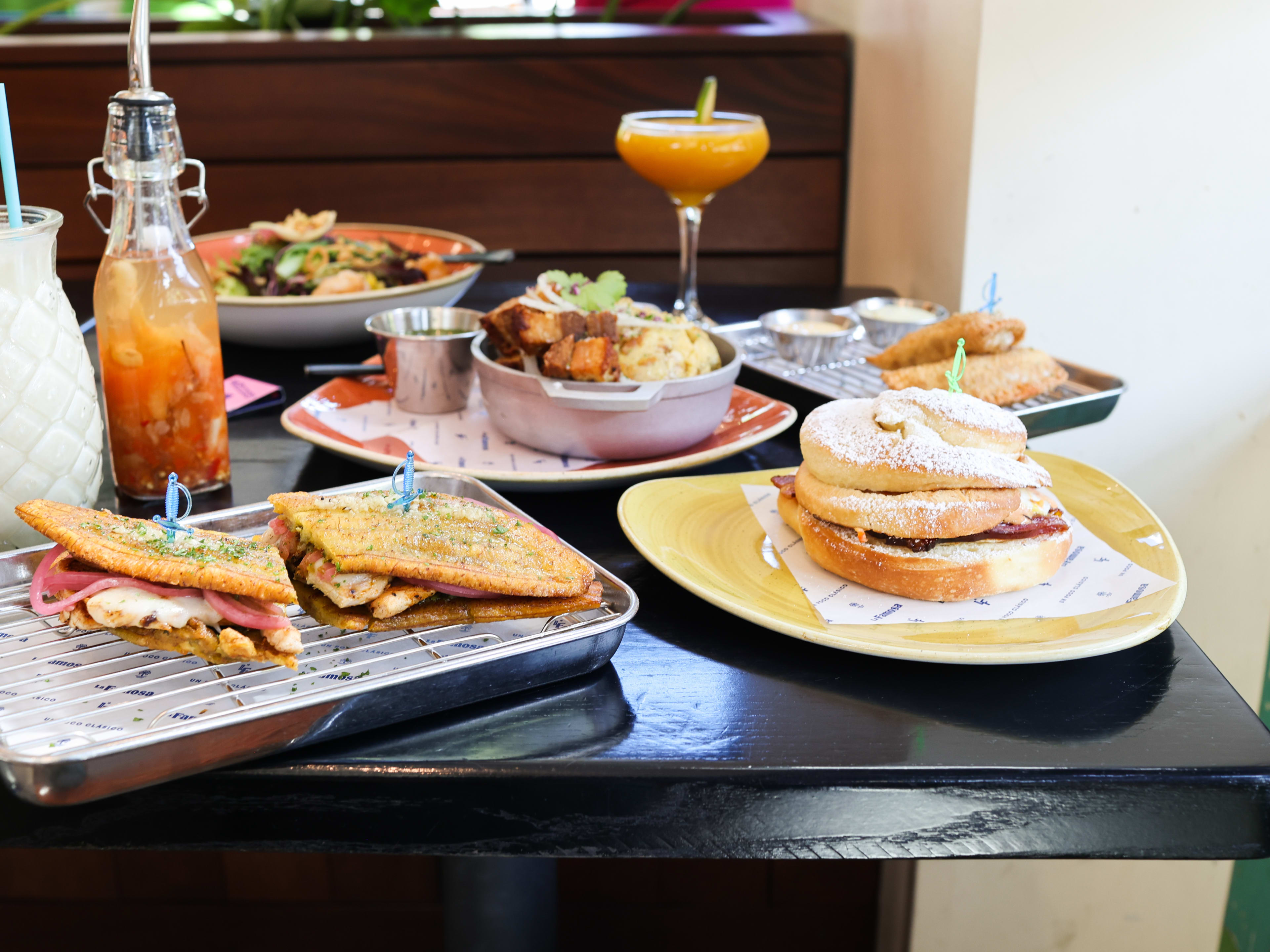 spread of puerto rican dishes and drinks