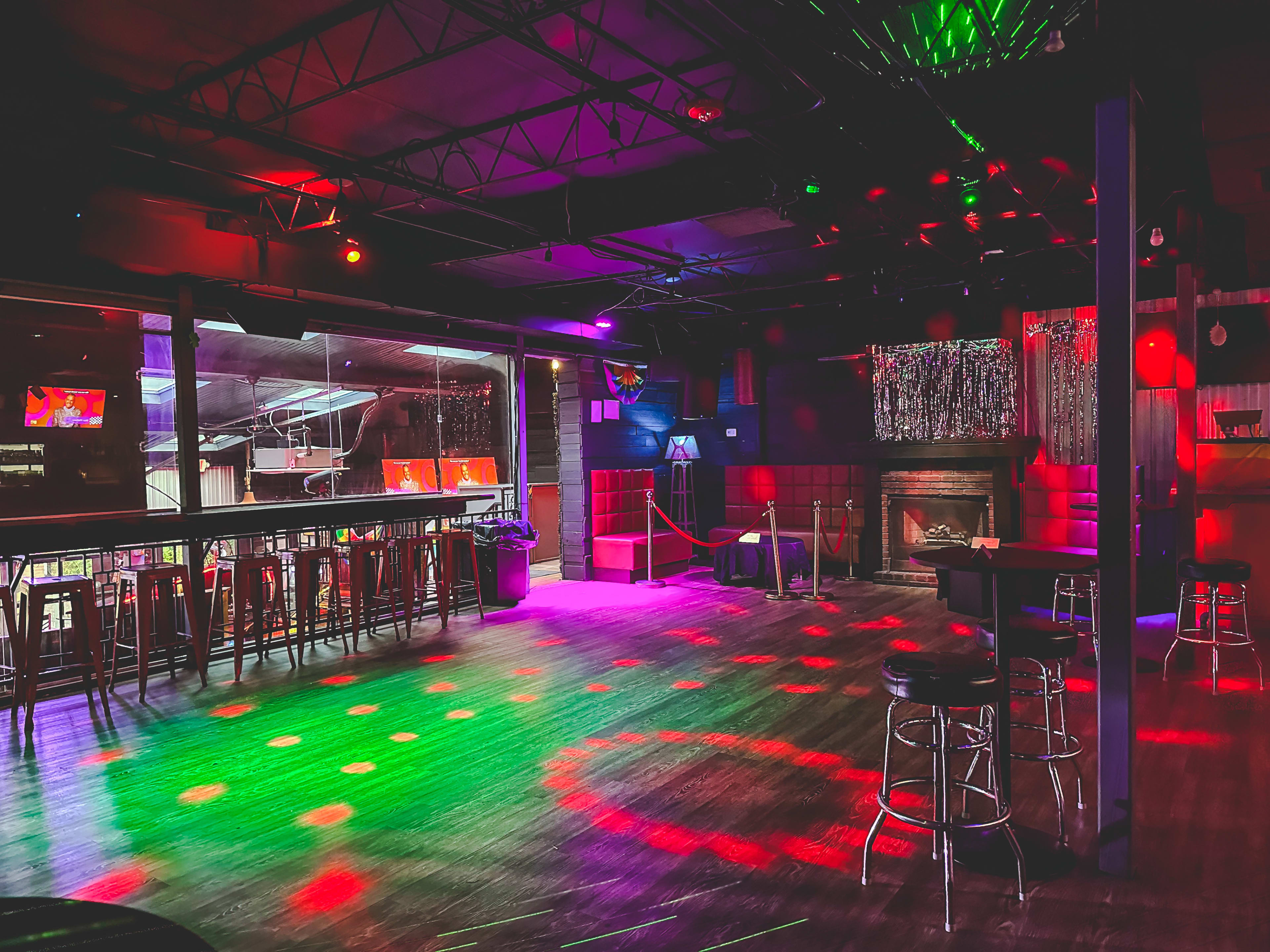 A dance floor with colorful lights.