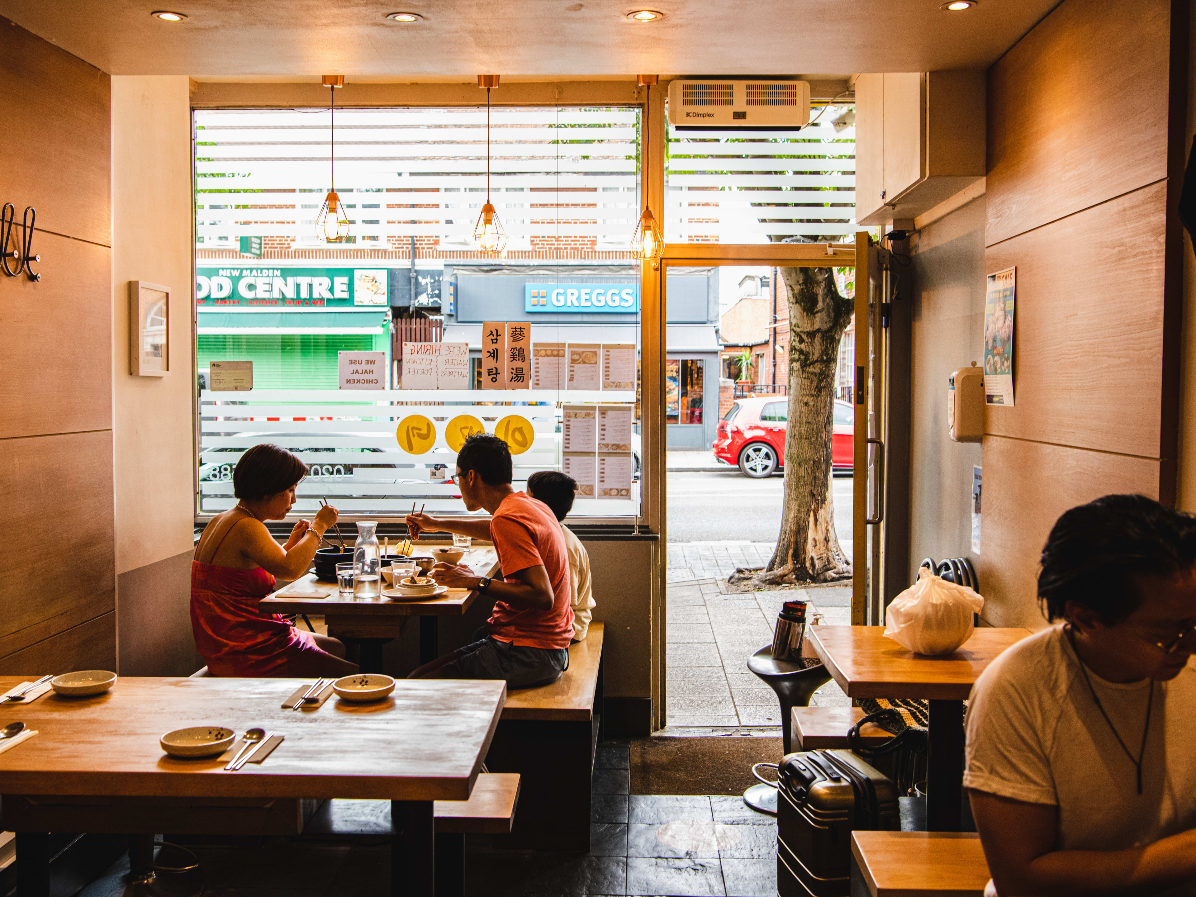 People dining in the small space at Imone.