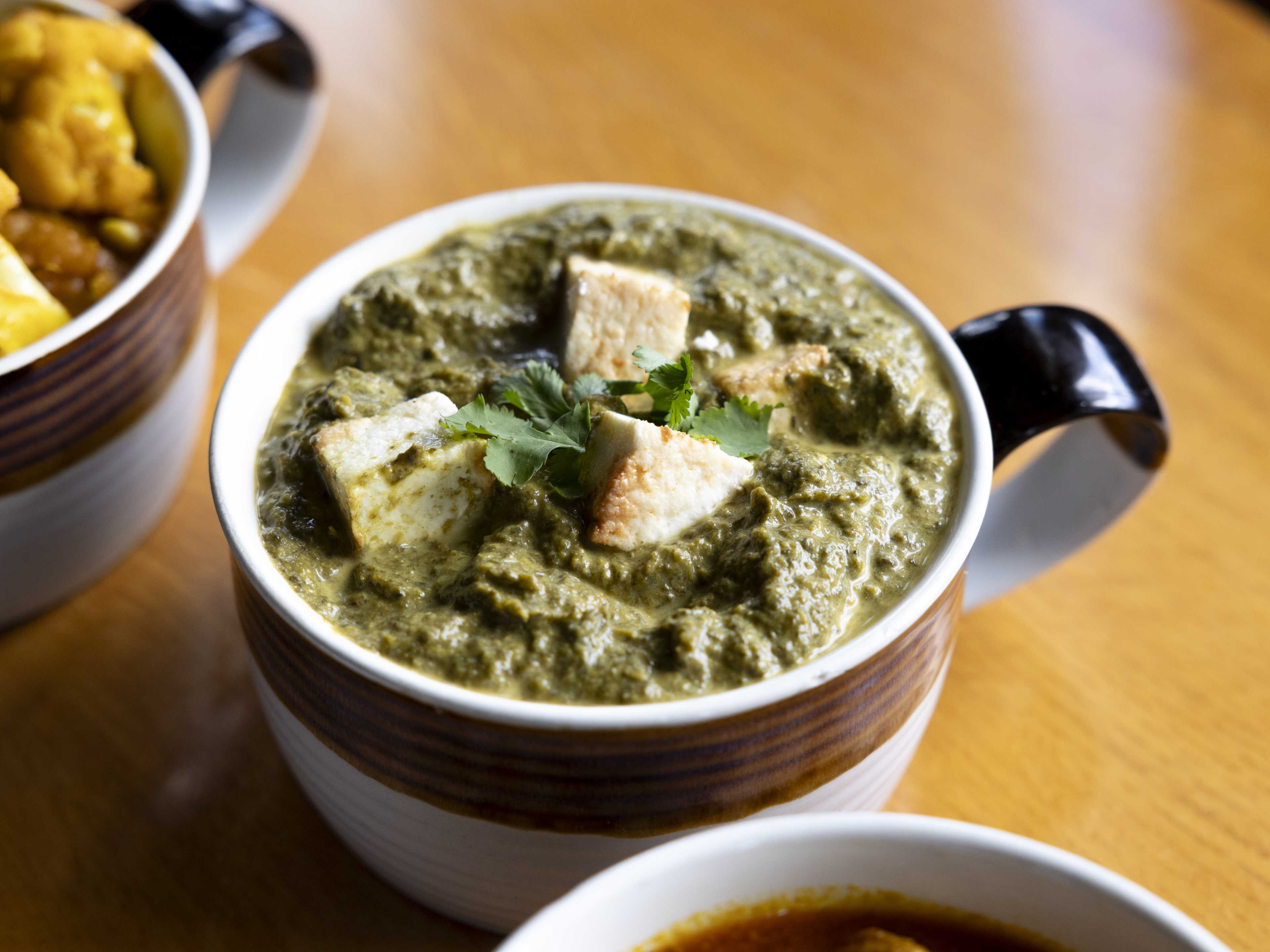 Mug full of saag paneer