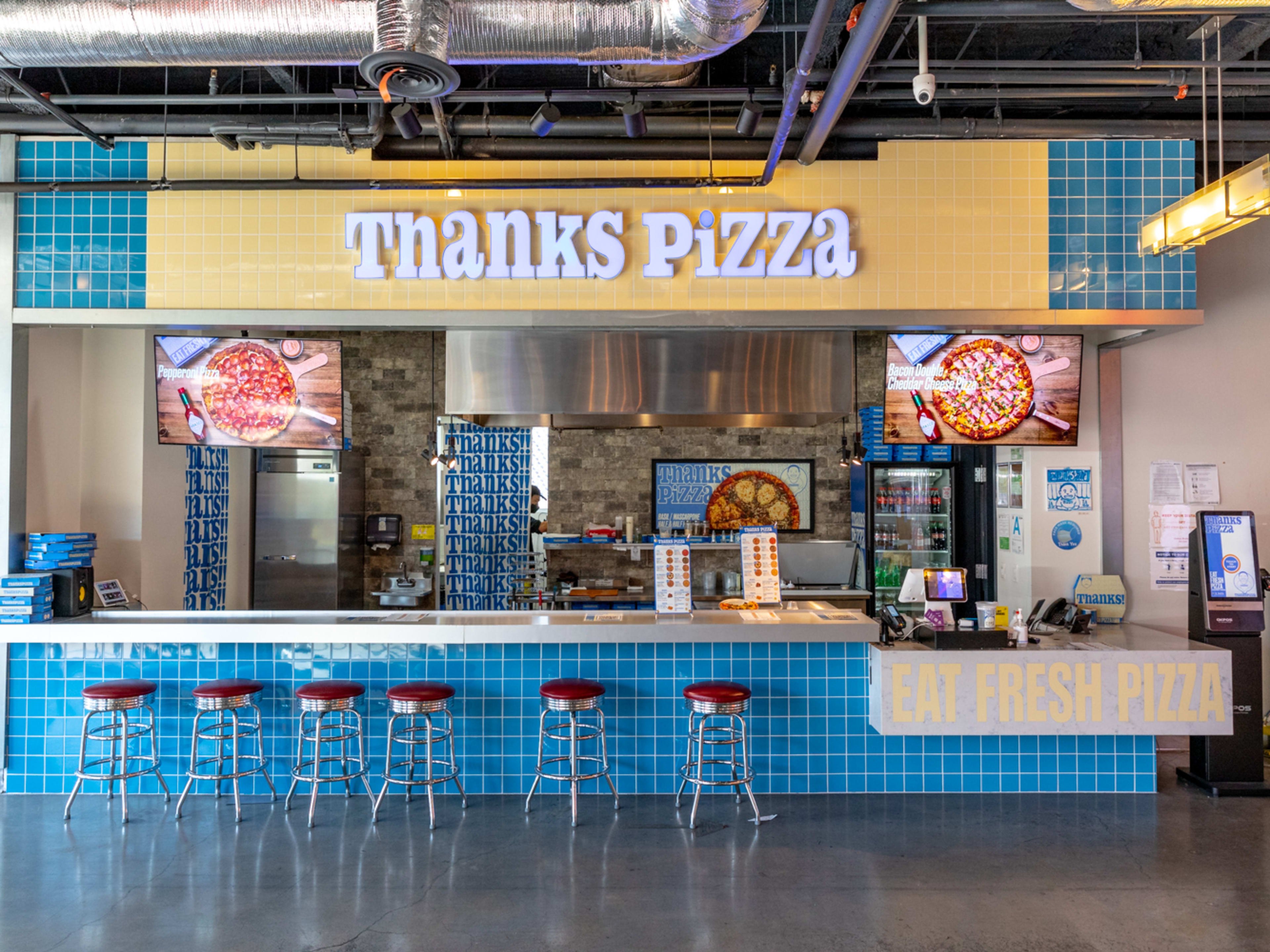 The interior of Thanks Pizza.