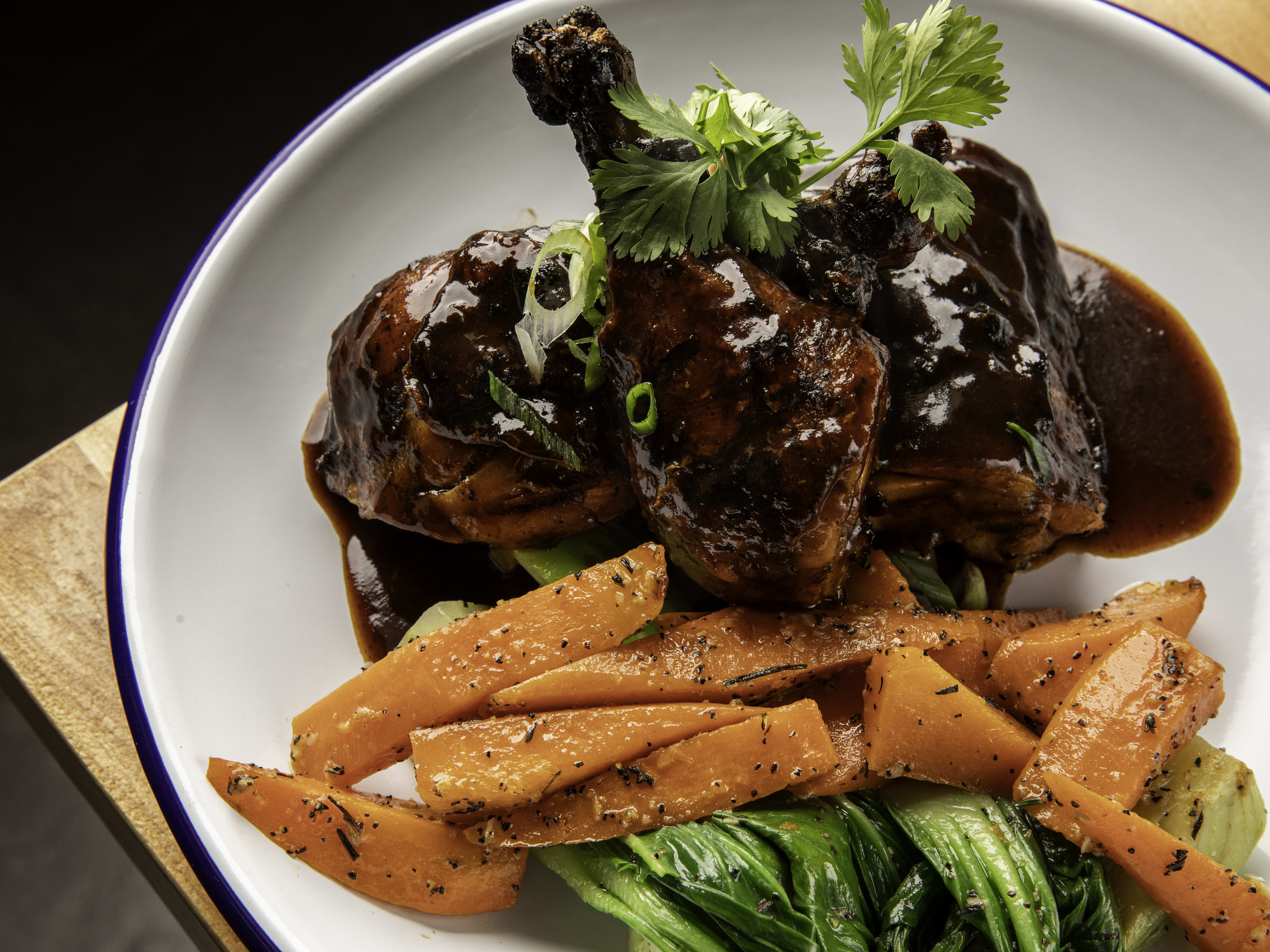 Jerk chicken with steamed carrots