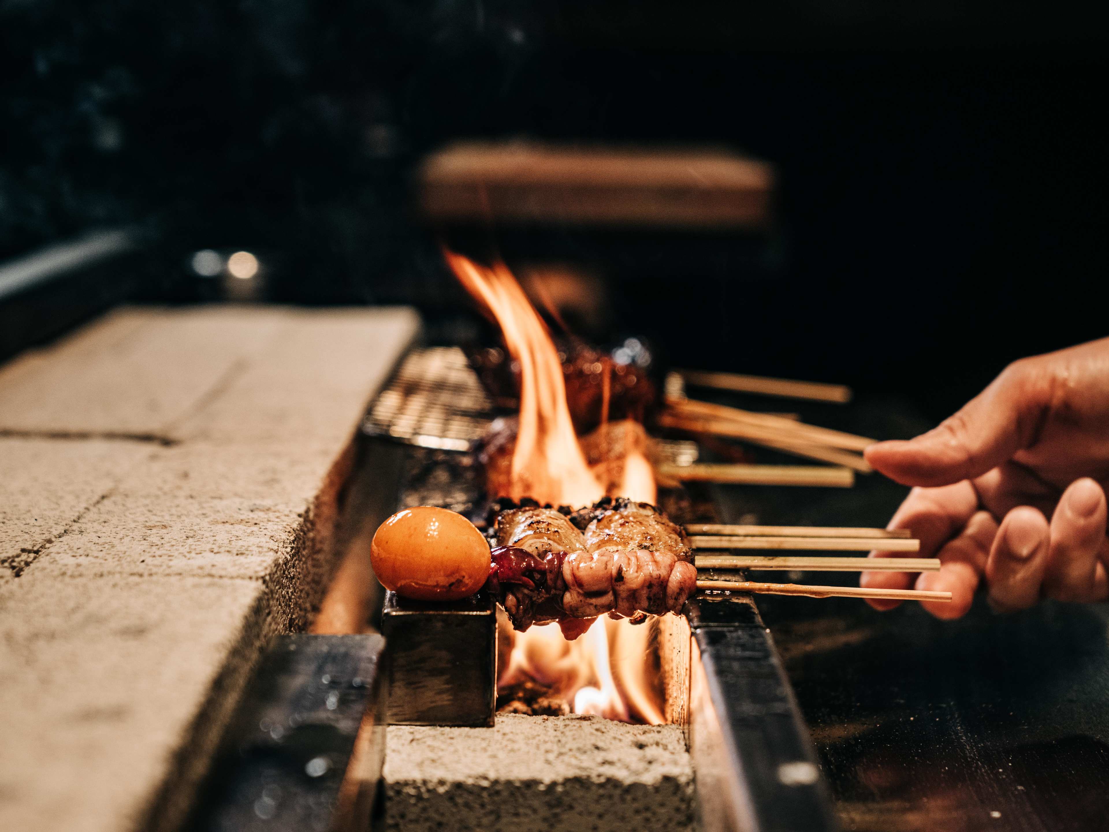 yakitori skewers on a binchotan grill