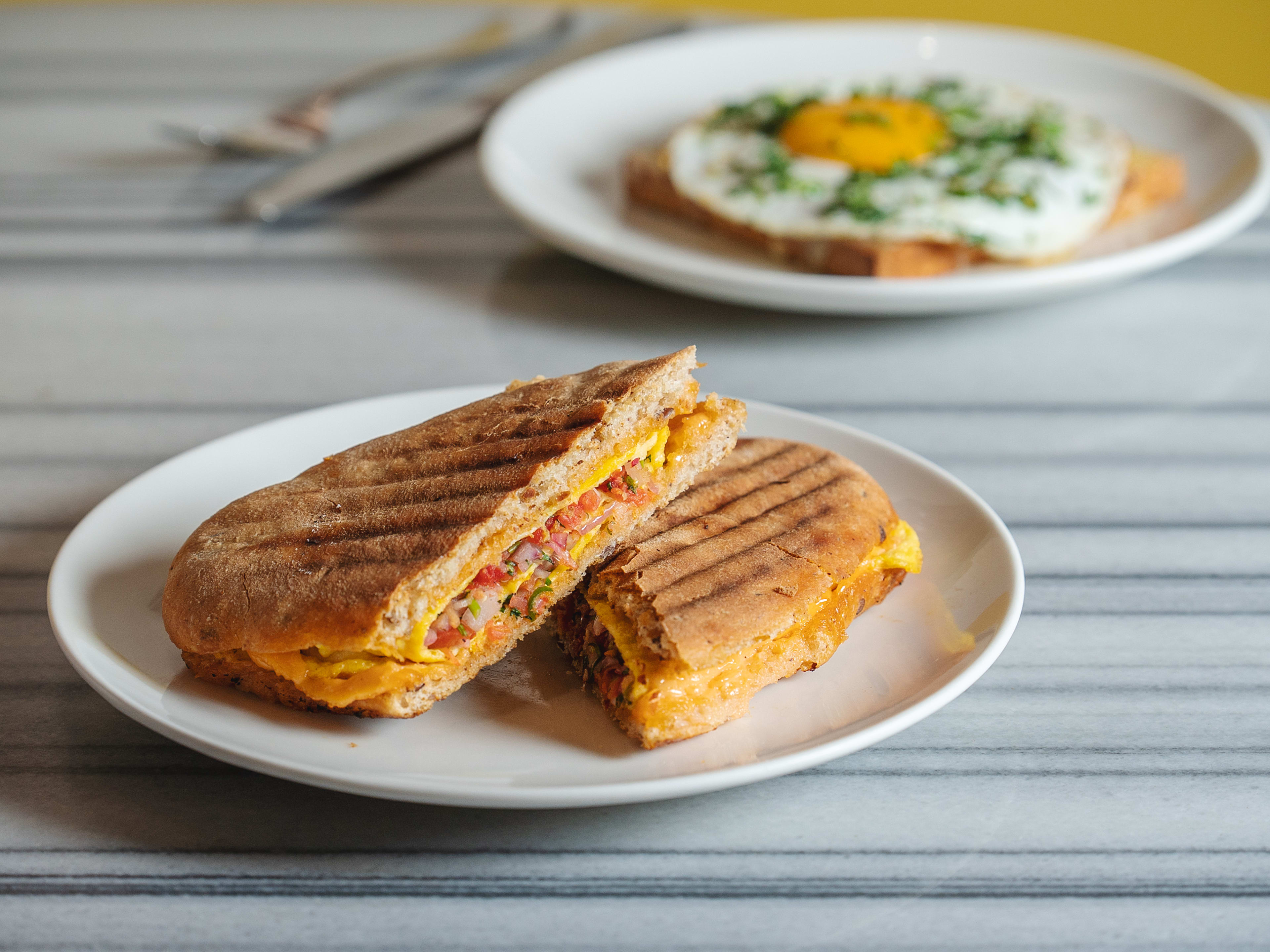 Rasta sandwich on white ceramic plate at Kala Ghoda Cafe