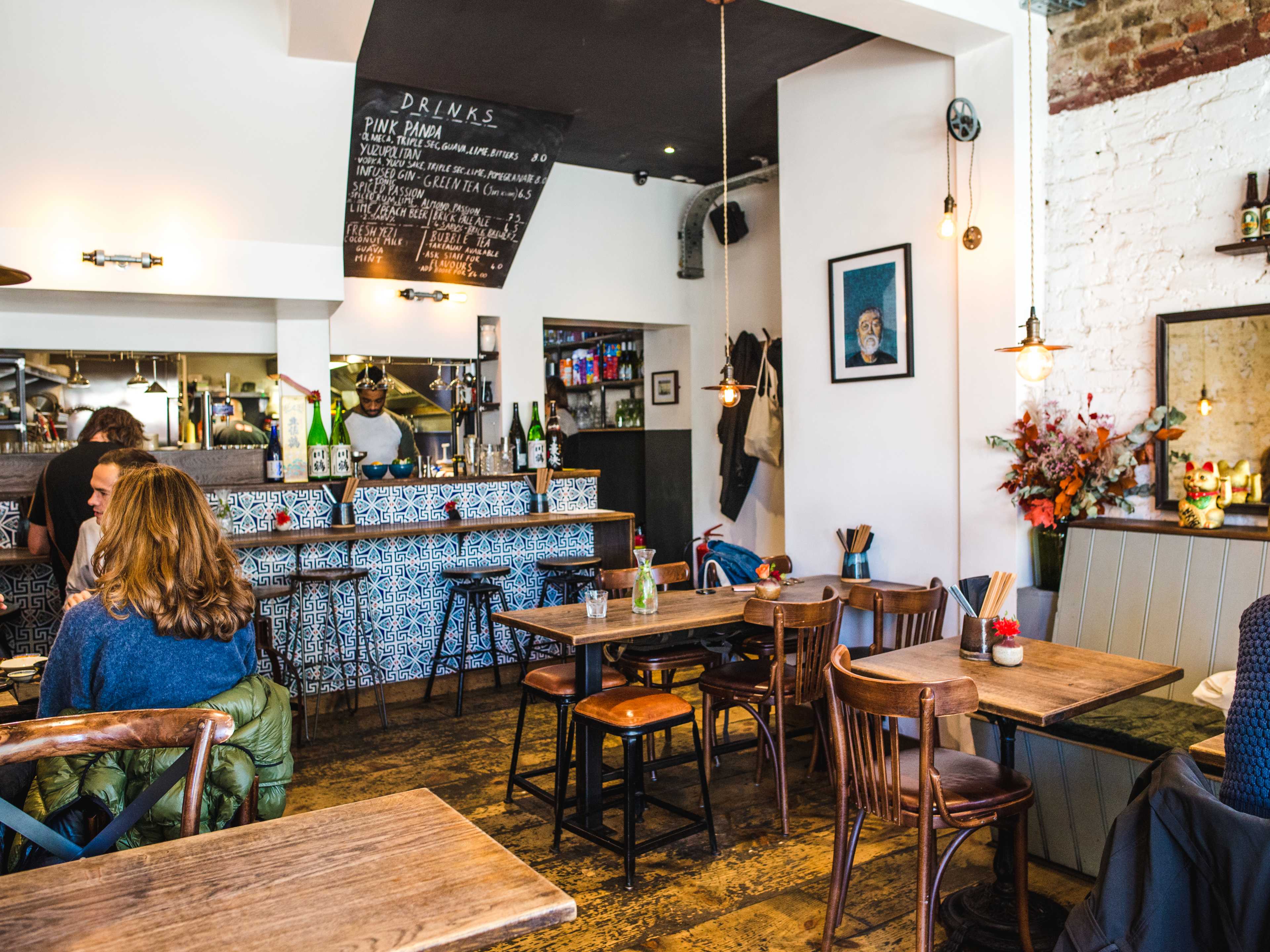 The interior seating and bar area at Mr Bao.