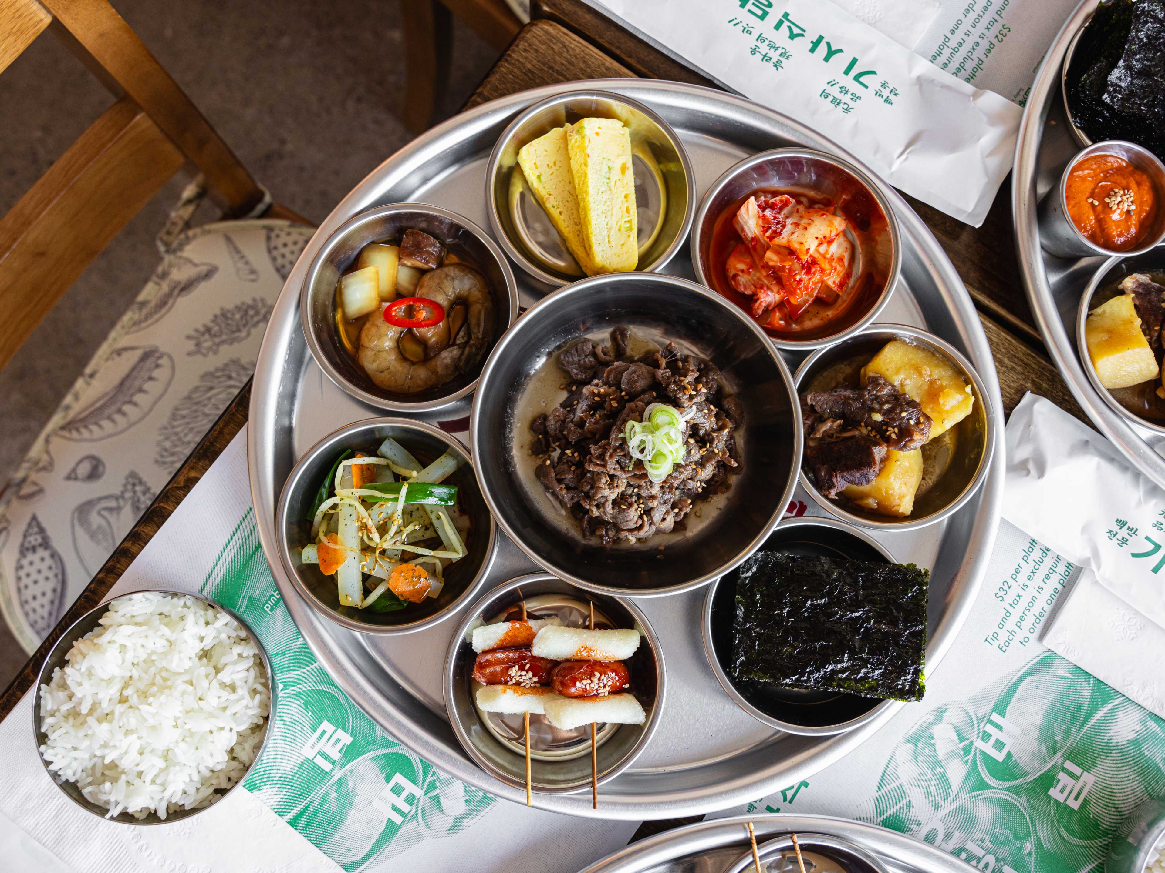 A big platter of Korean food with lots of sides.