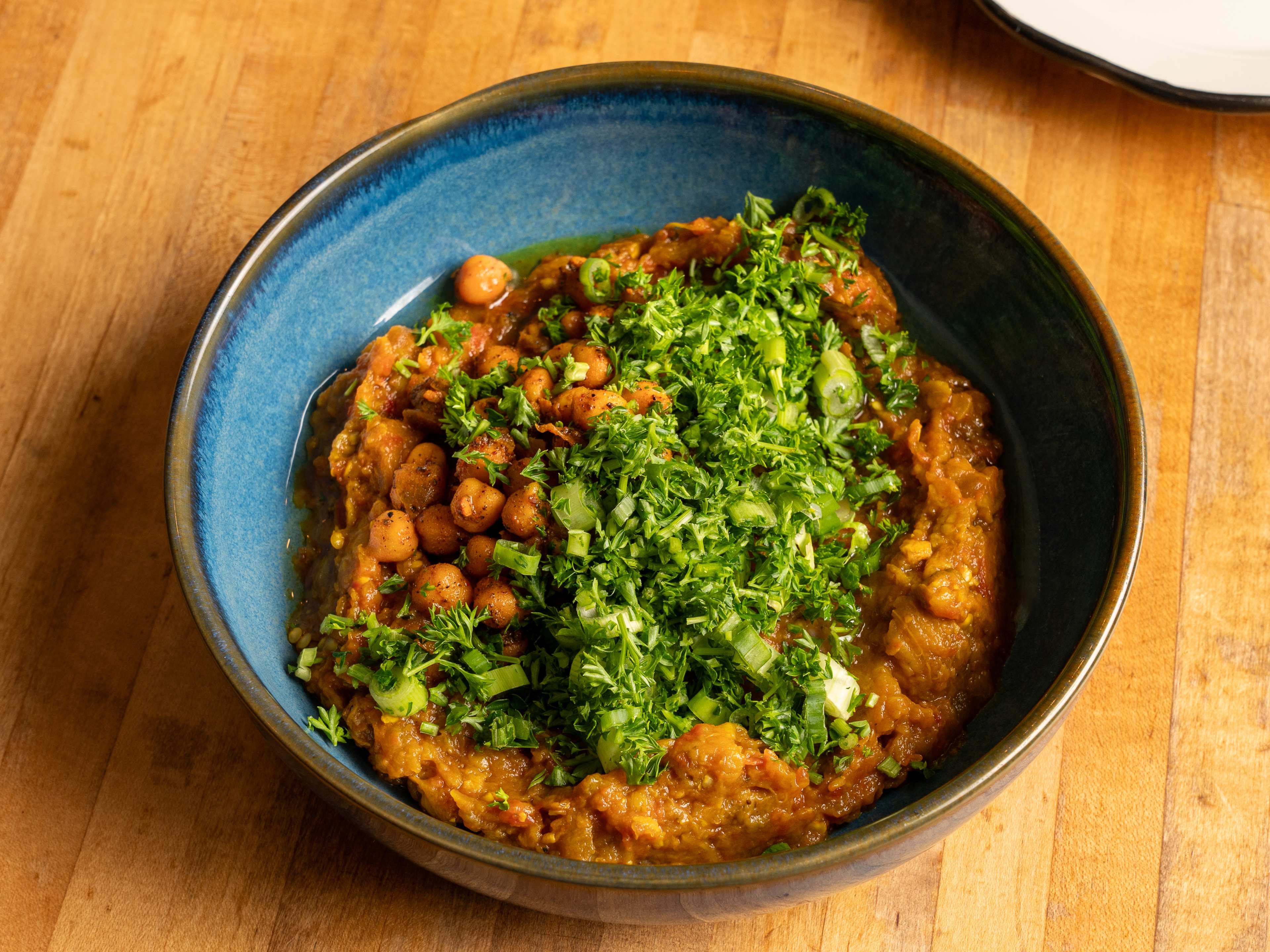 The garlicky eggplant bowl at Komaaj Mazze Wine Bar