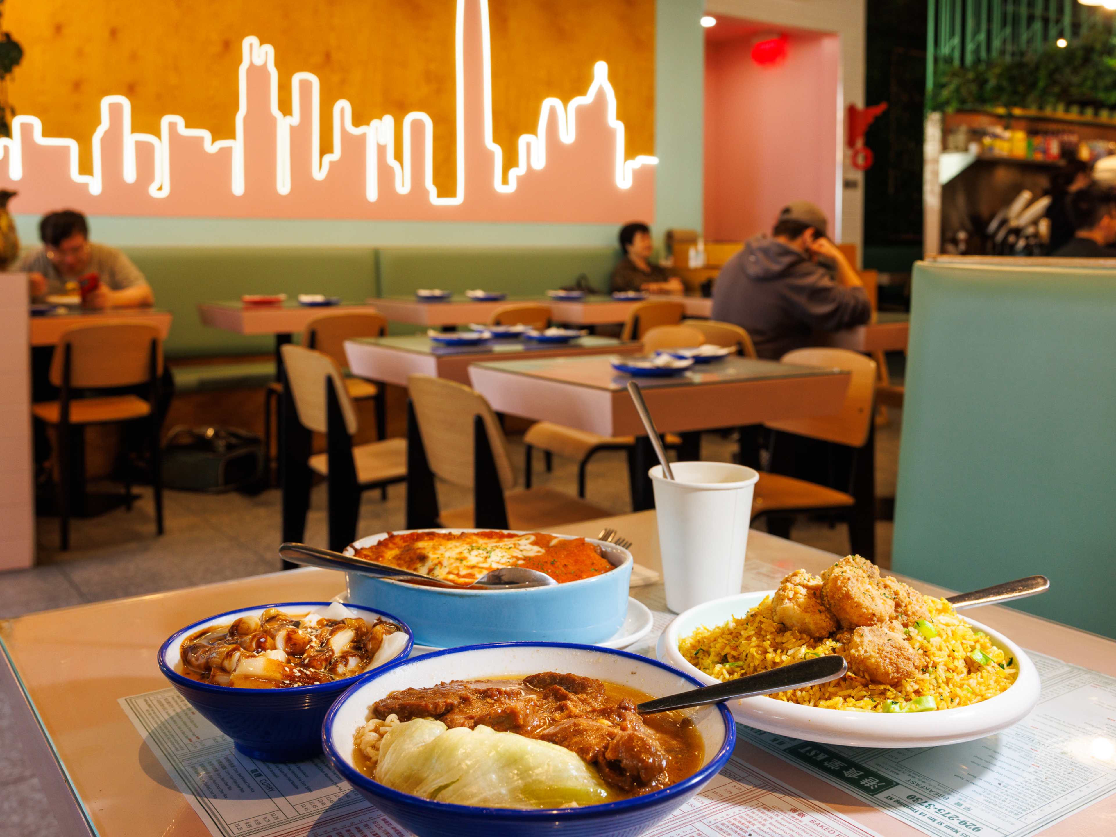 Four plates of food on a table.