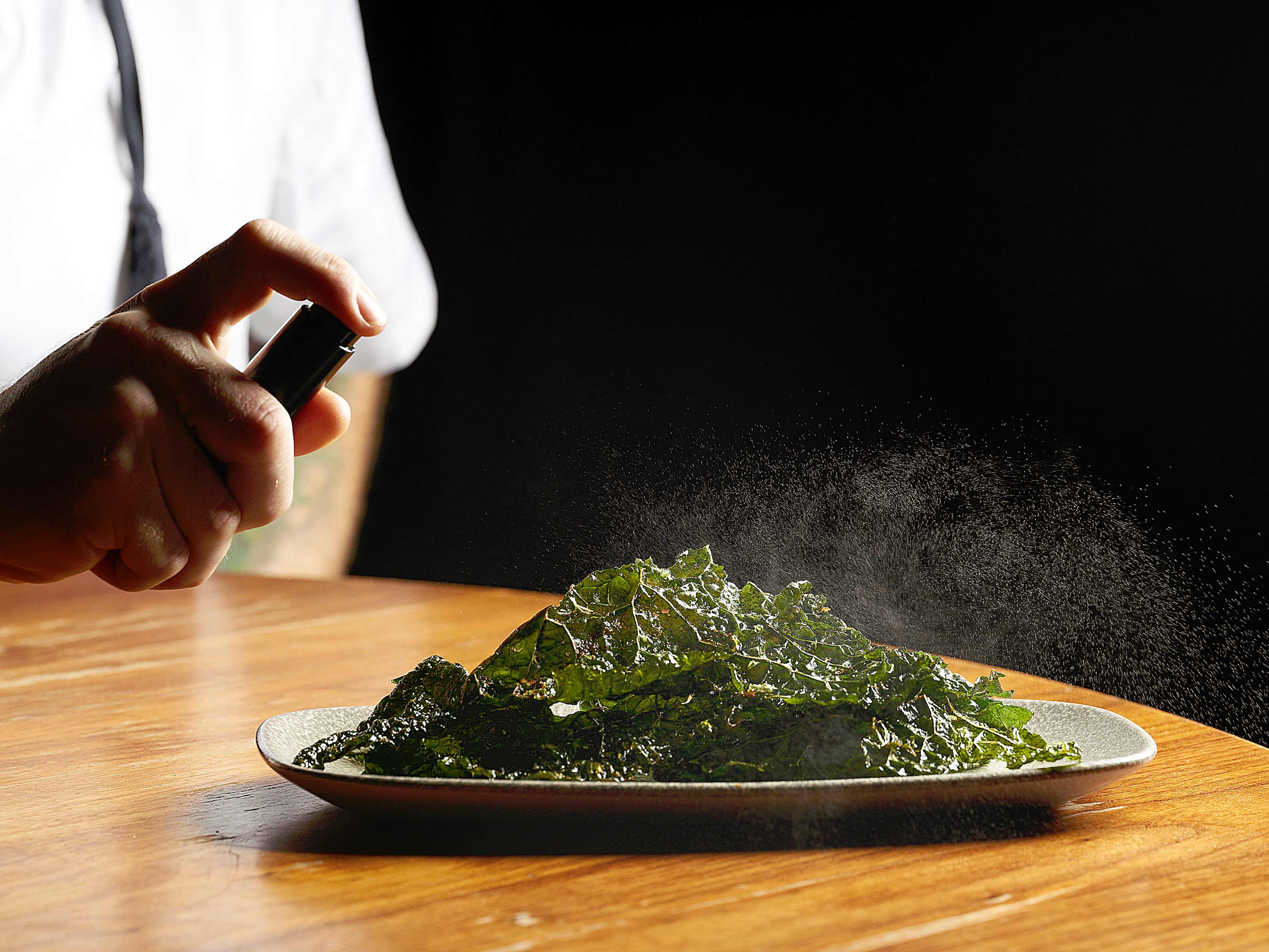 Kale chips sprayed with yuzu fish oil