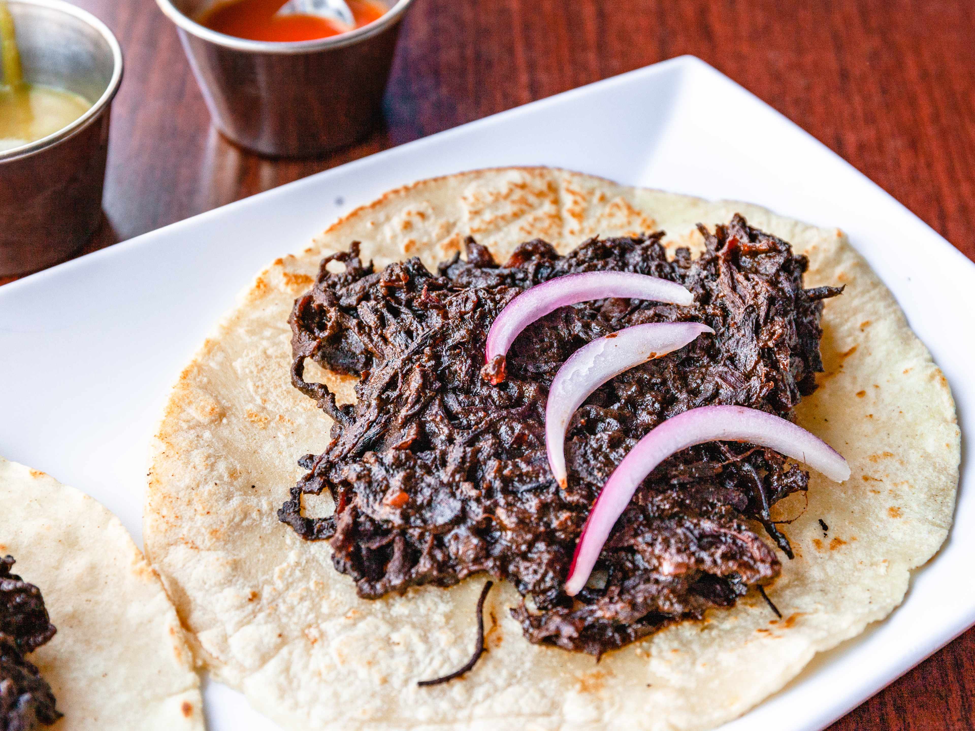 The vegan mole tacos from Tlayuda LA.