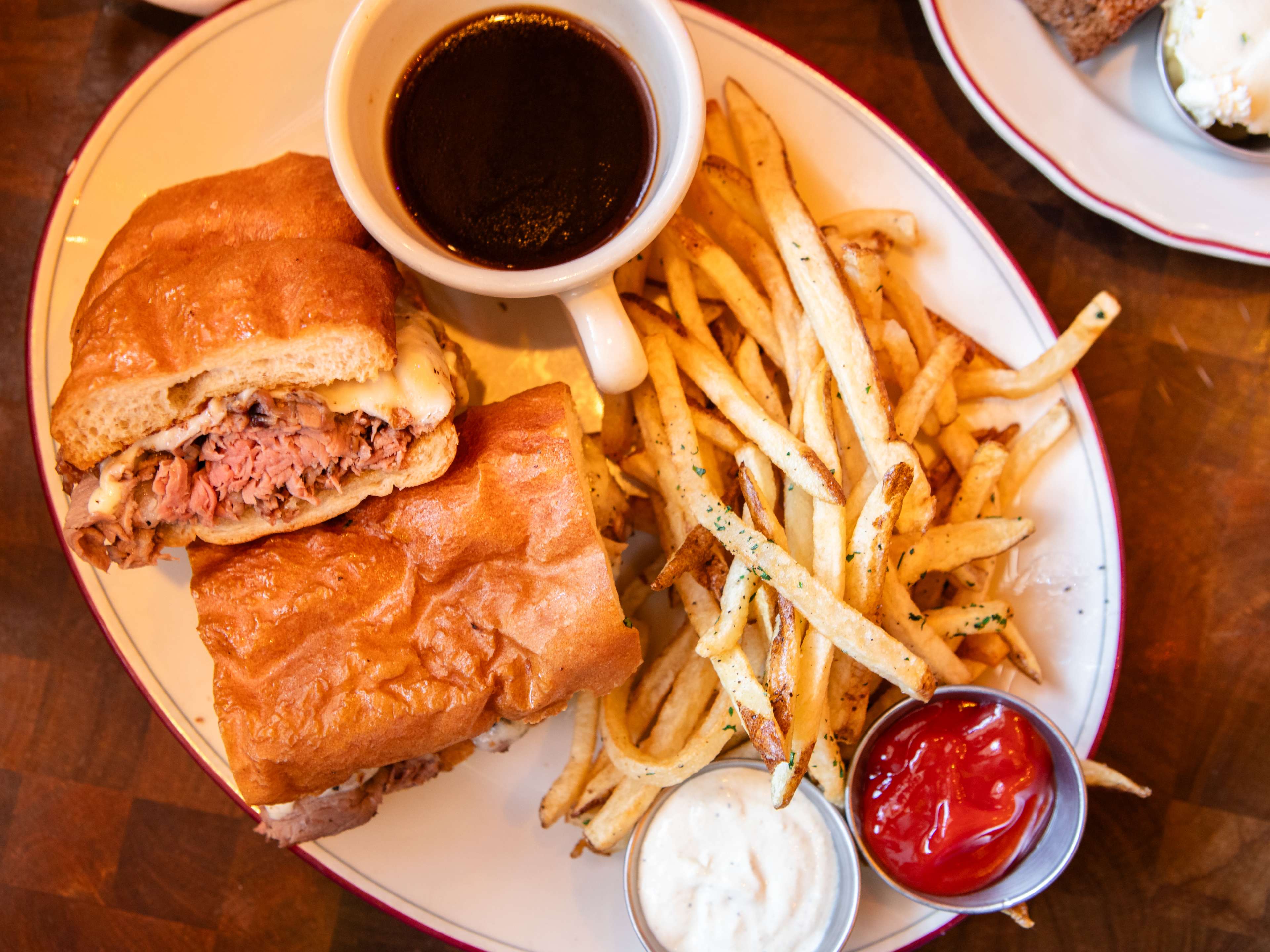 french dip sandwich at Laurenzo's with a side of beef jus and fries