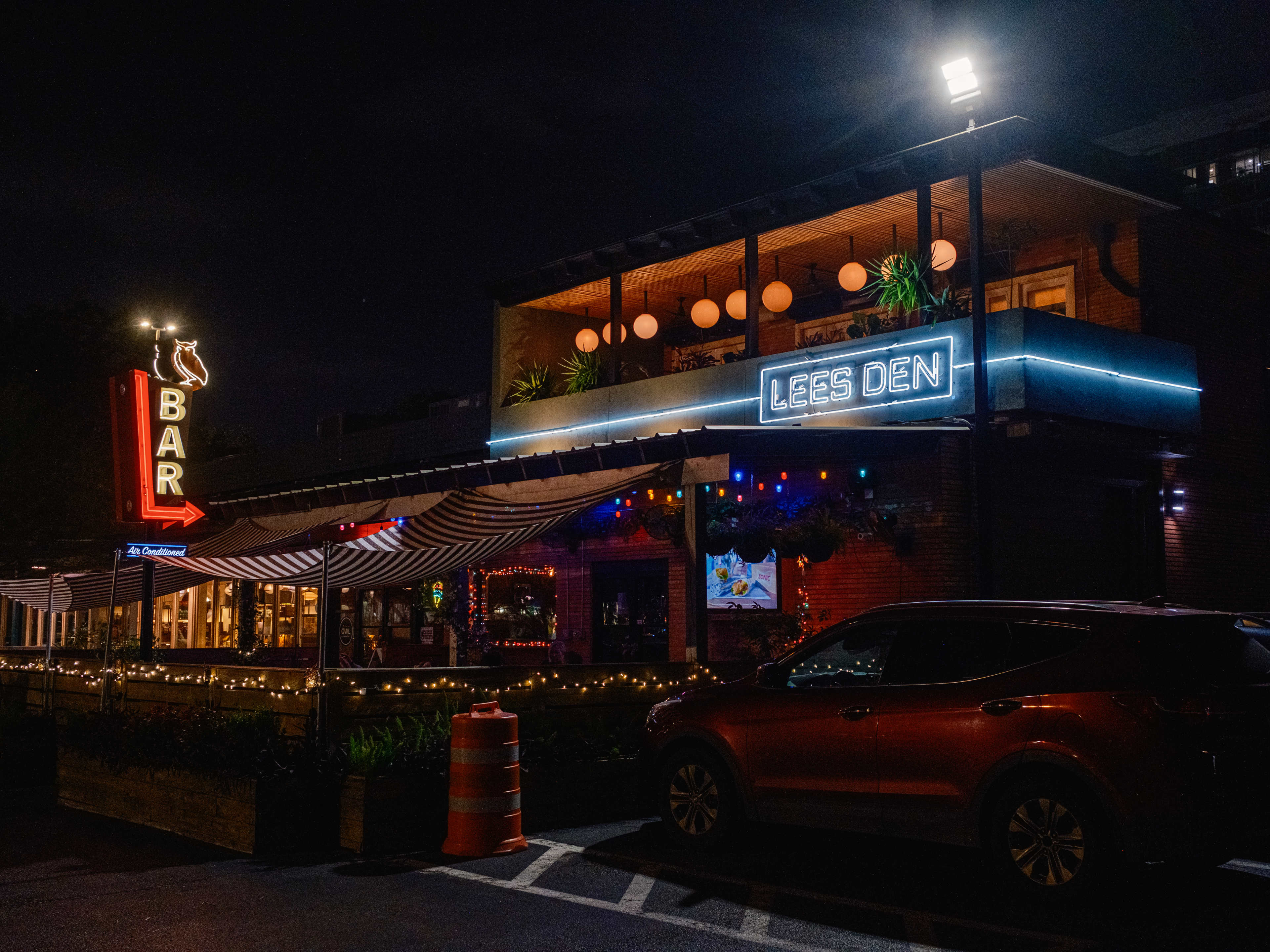 The exterior of Lee's Den at night.