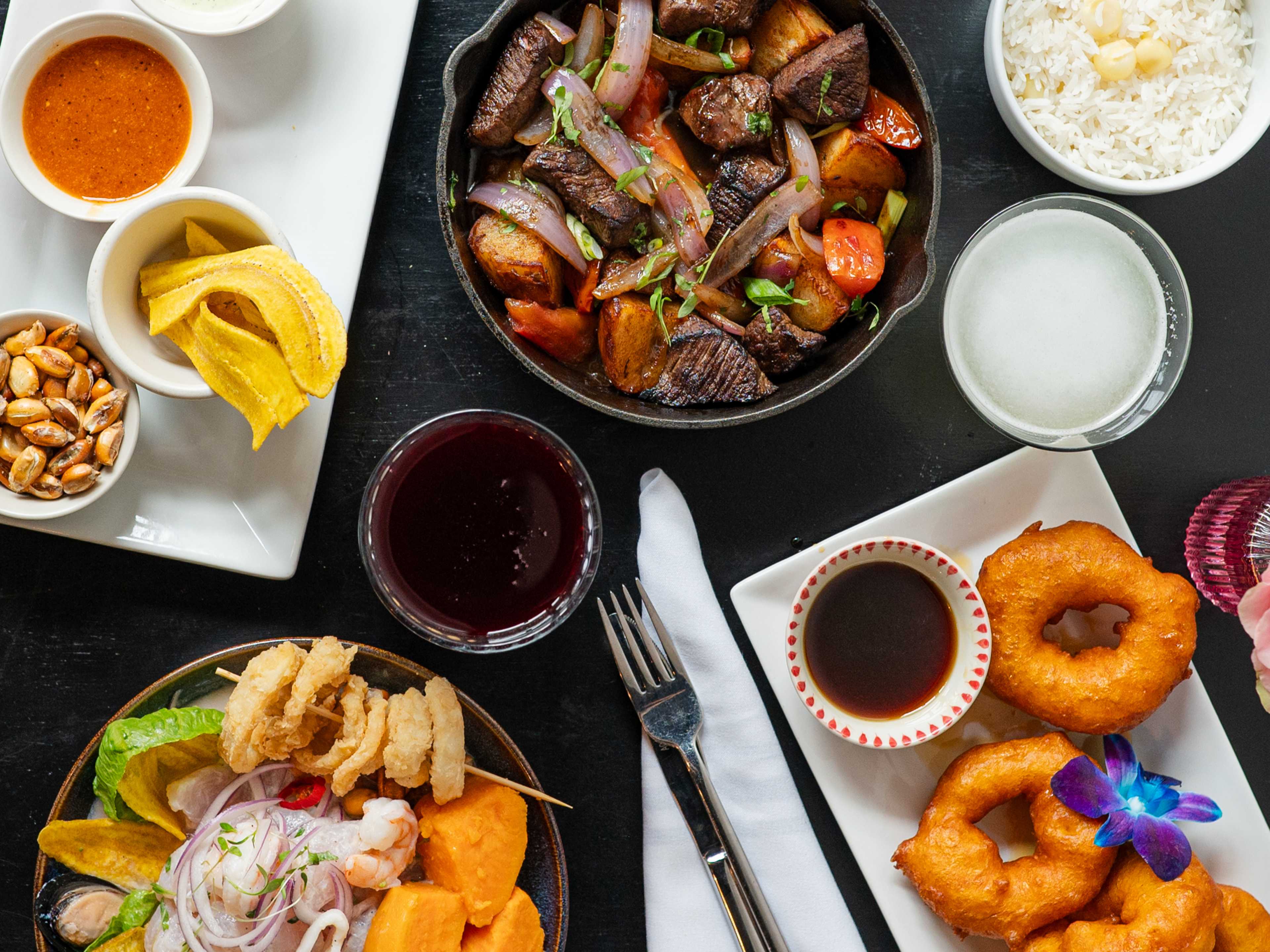 Overhead shot of Peruvian dishes from Limo.