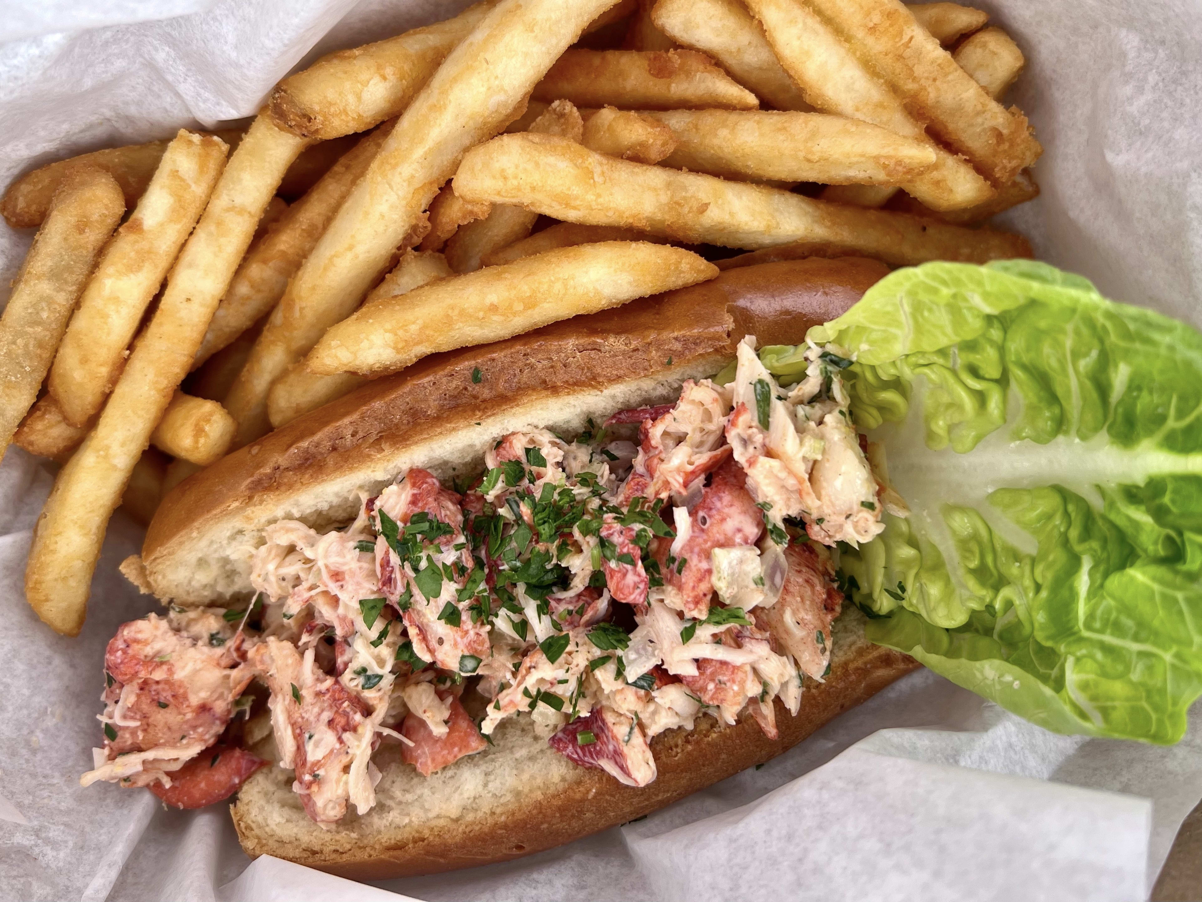 Lobster roll with fries at Lost Pier Cafe