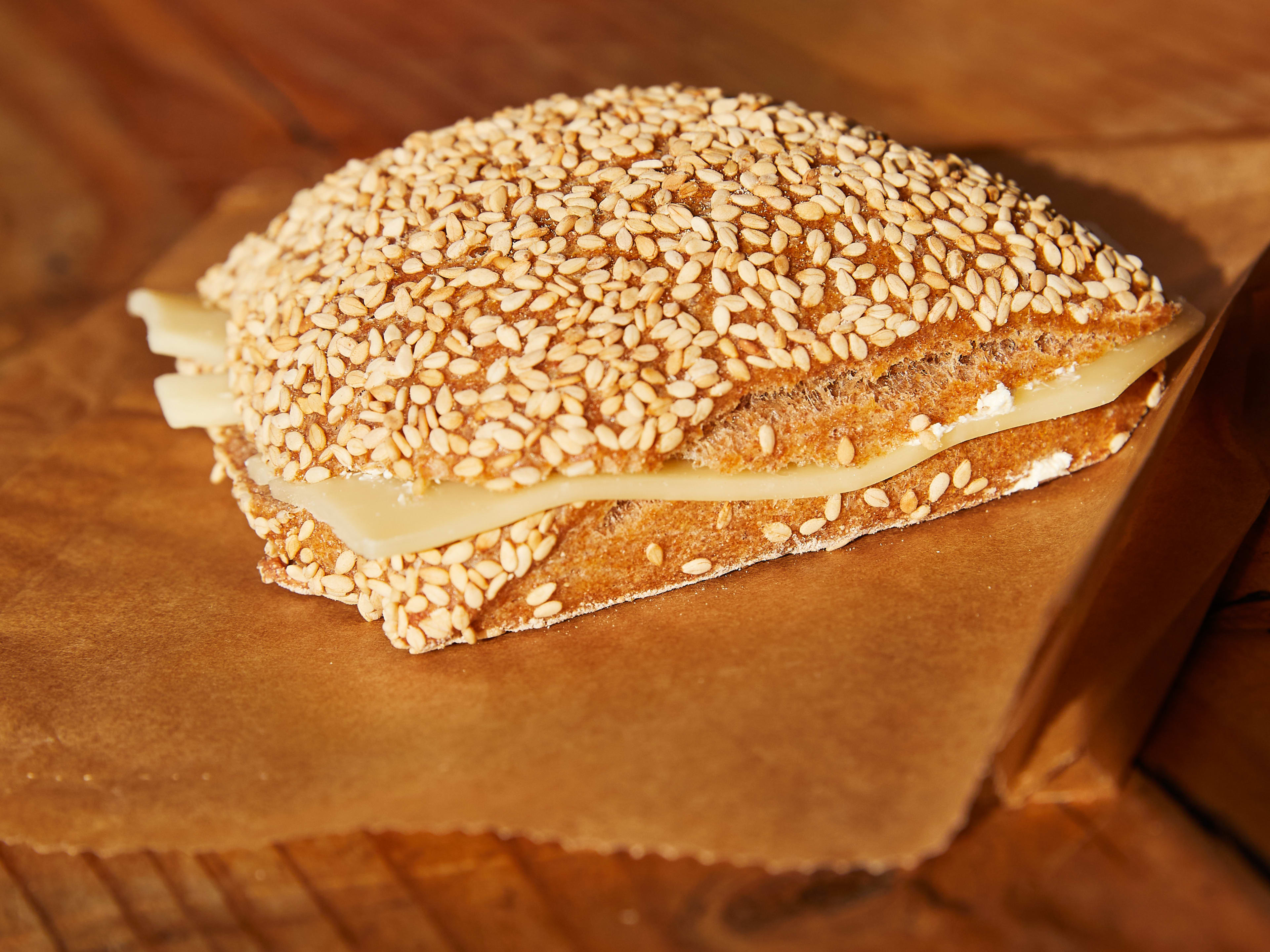 The sesame roll with Toma cheese and butter at Day Moon