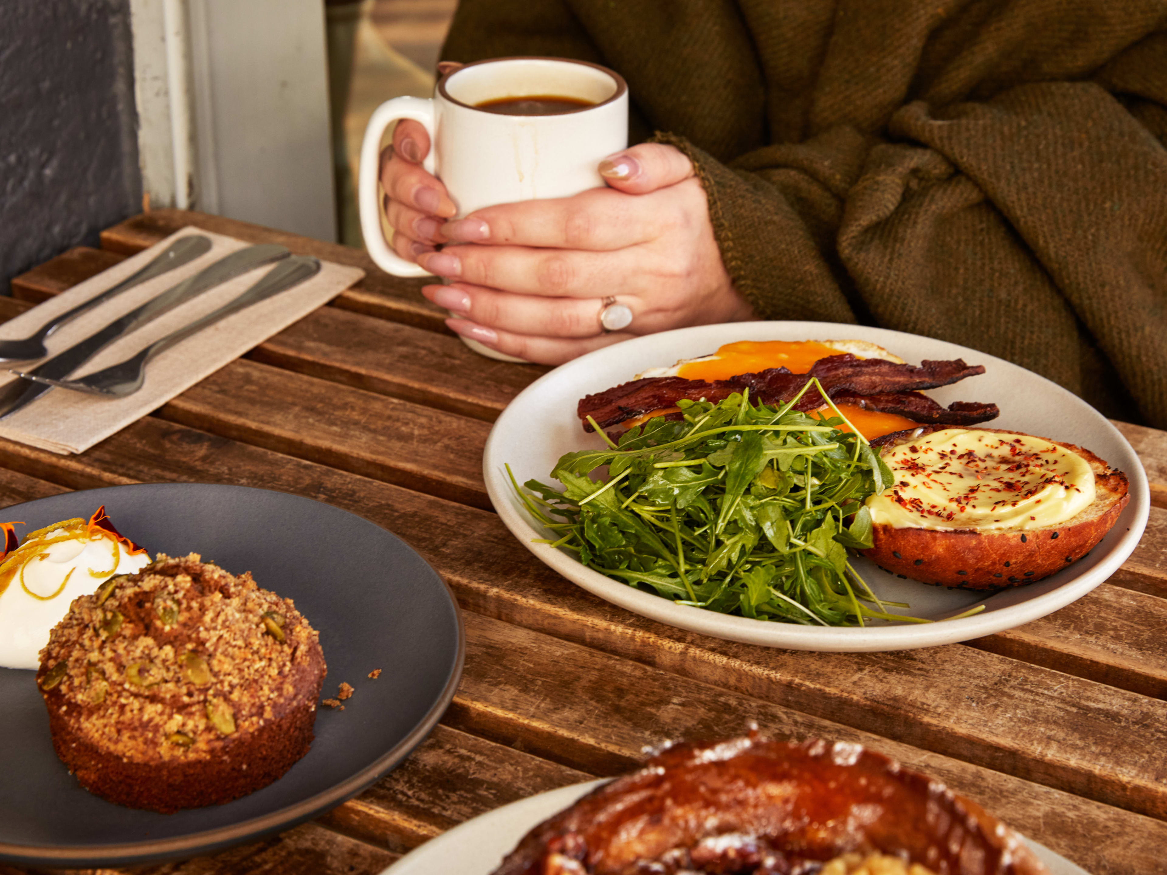 The breakfast sandwich, a pastry, and coffee from Outerlands