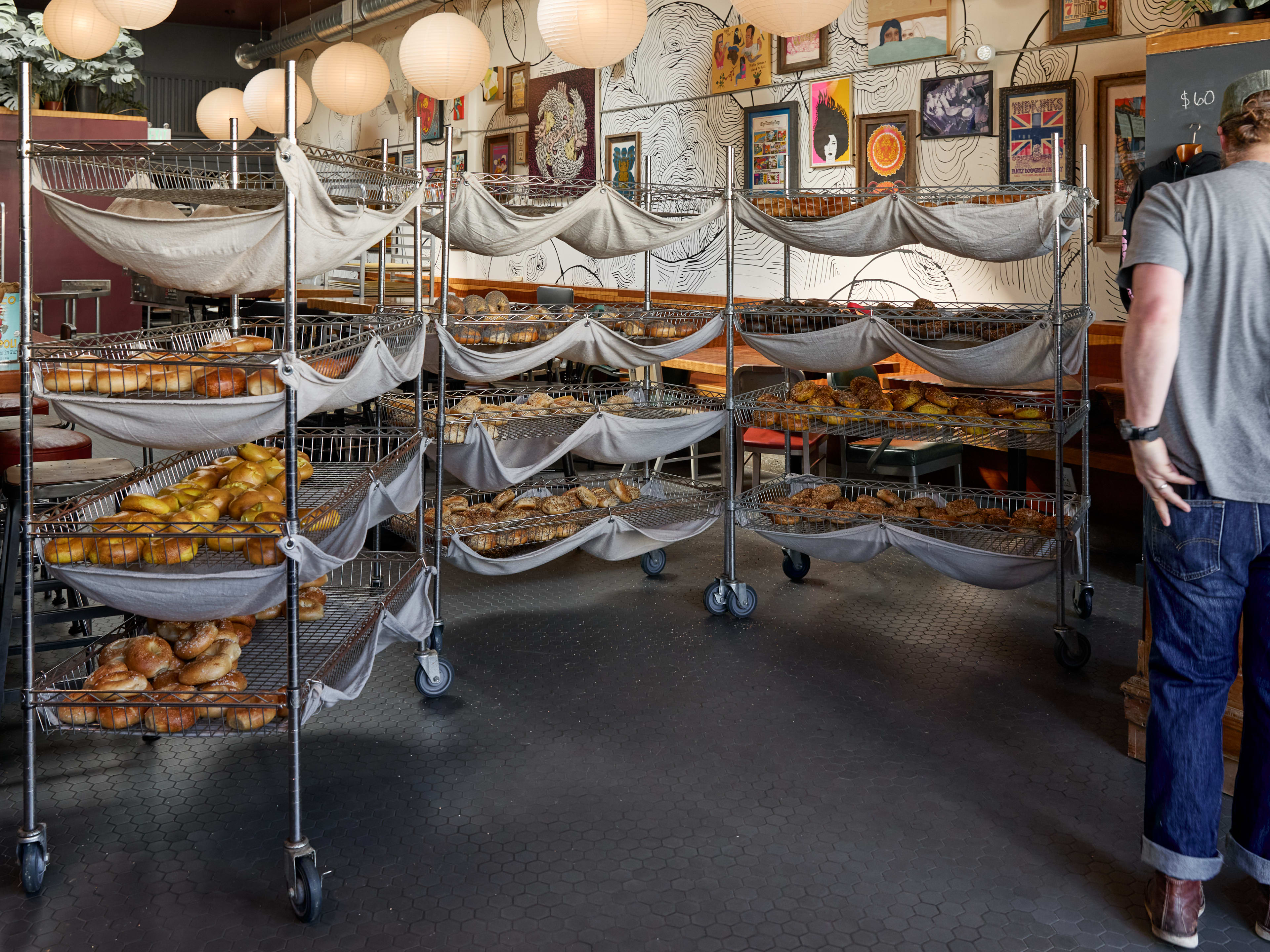 The rolling carts filled with bagel trays at The Laundromat