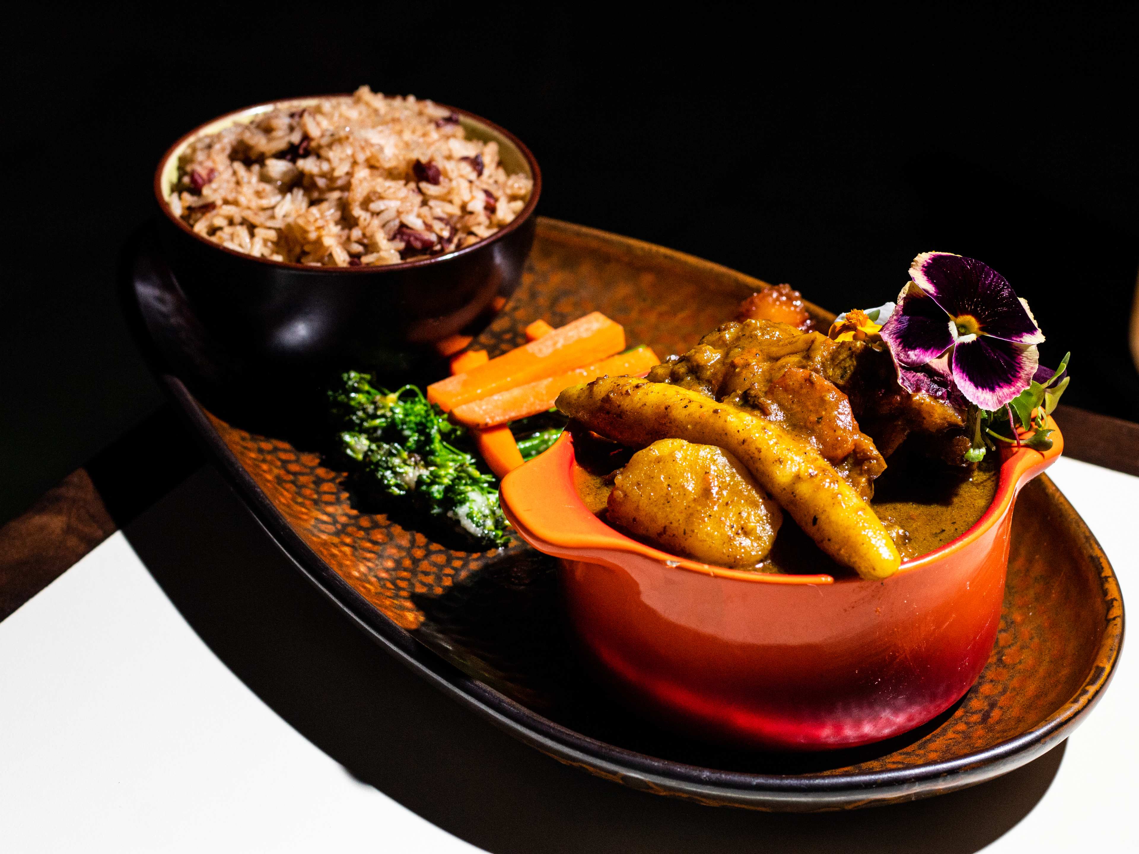 Curry oxtail with a side of rice.