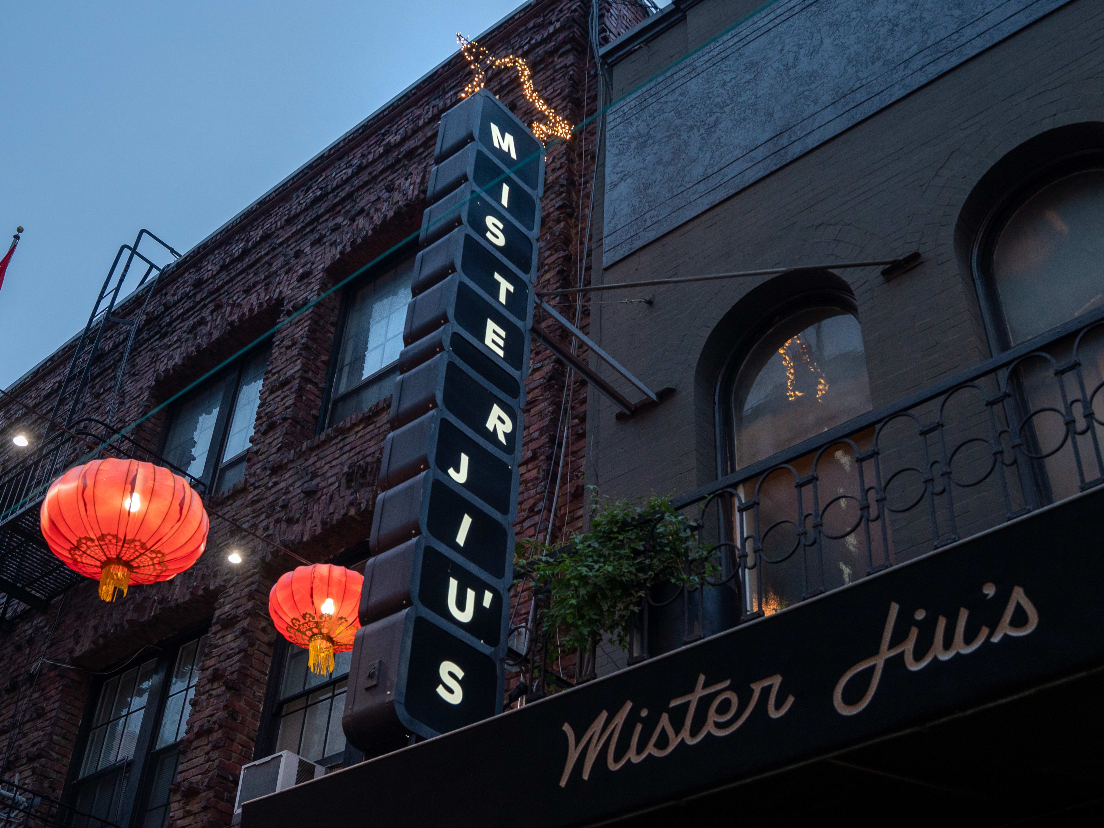 The exterior and Chinatown lanterns at Mister Jiu's