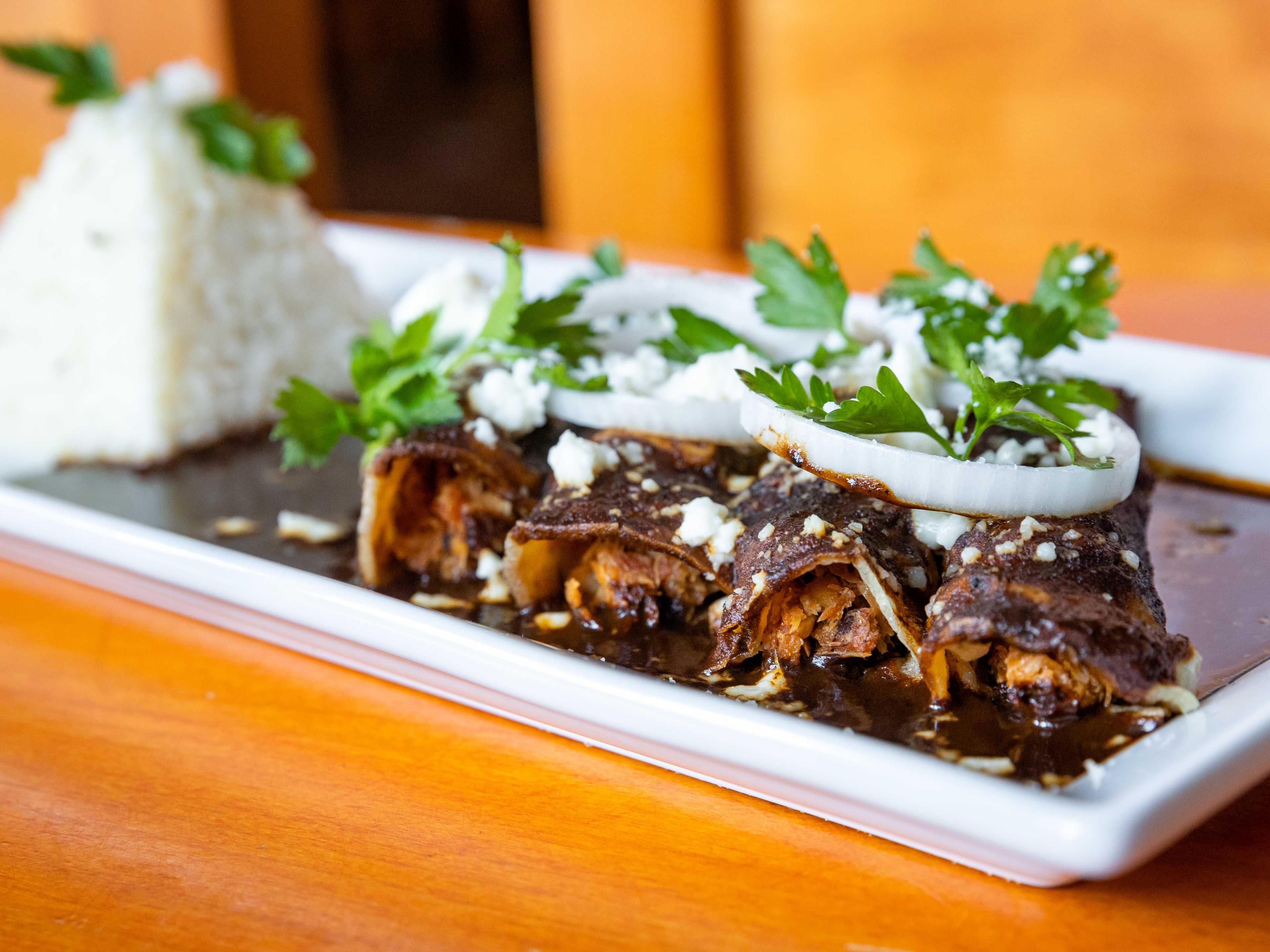 The tacos enchilados with mole negro from Monte Alban.