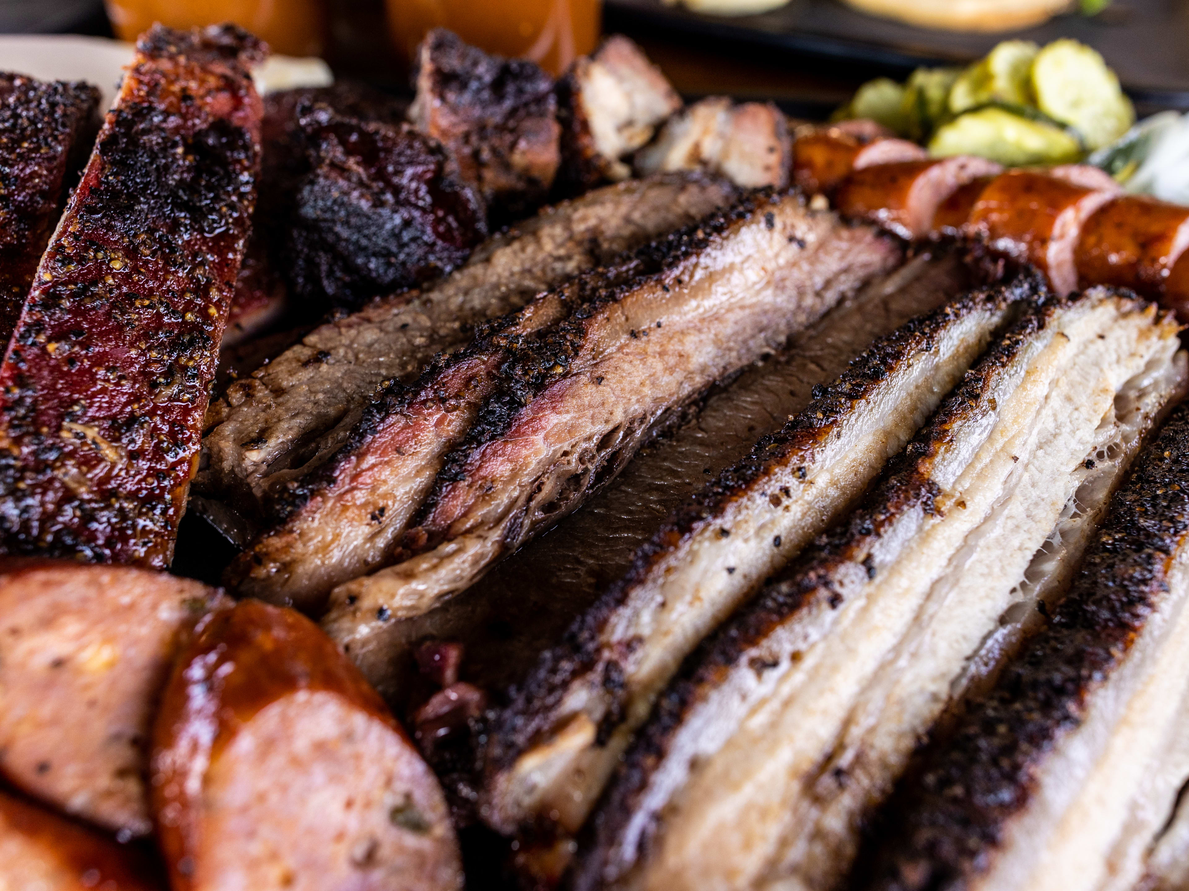 A platter of smoked meats from moreno barbecue.
