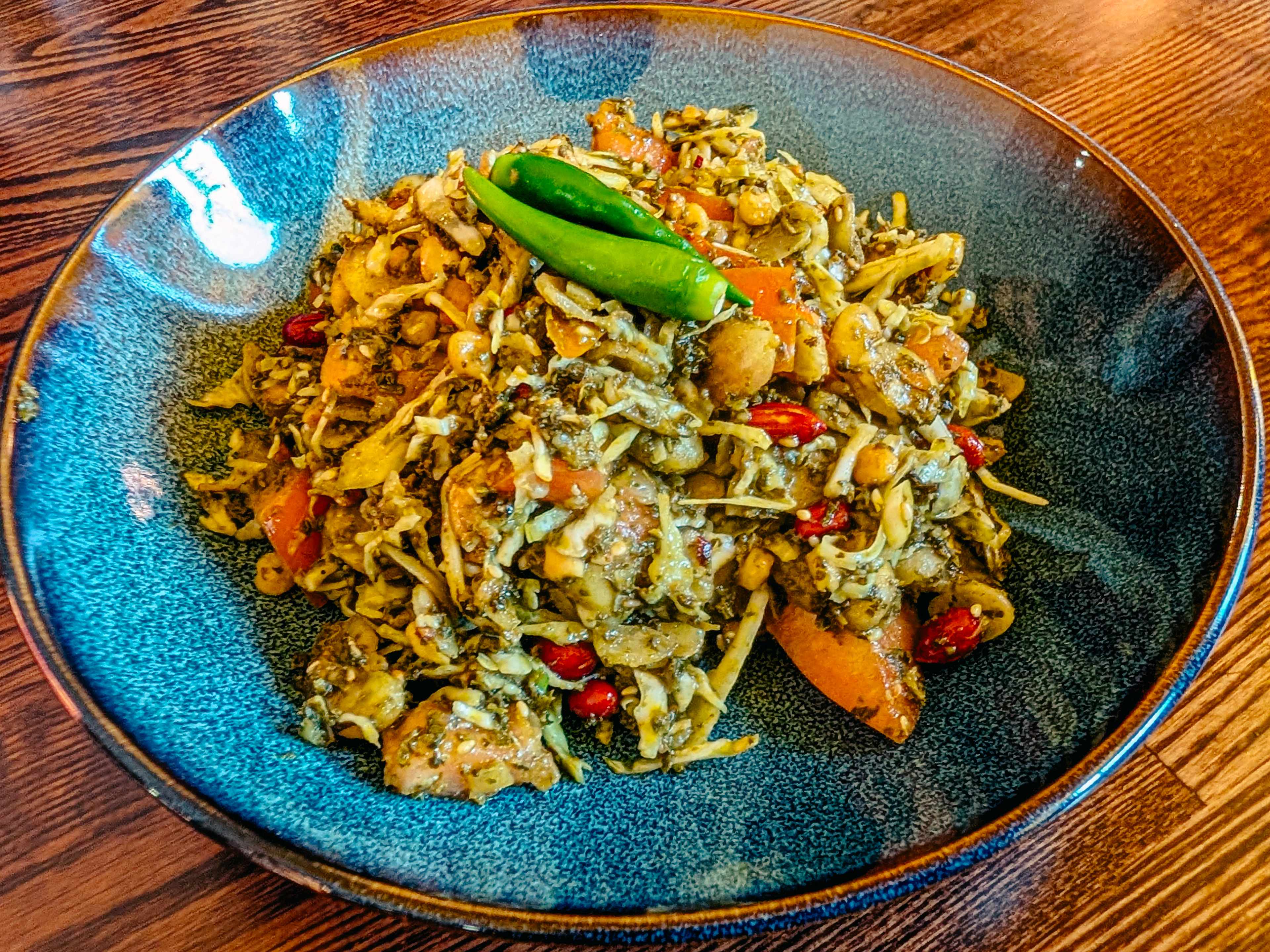 laphet salad with spourds and tea leaves