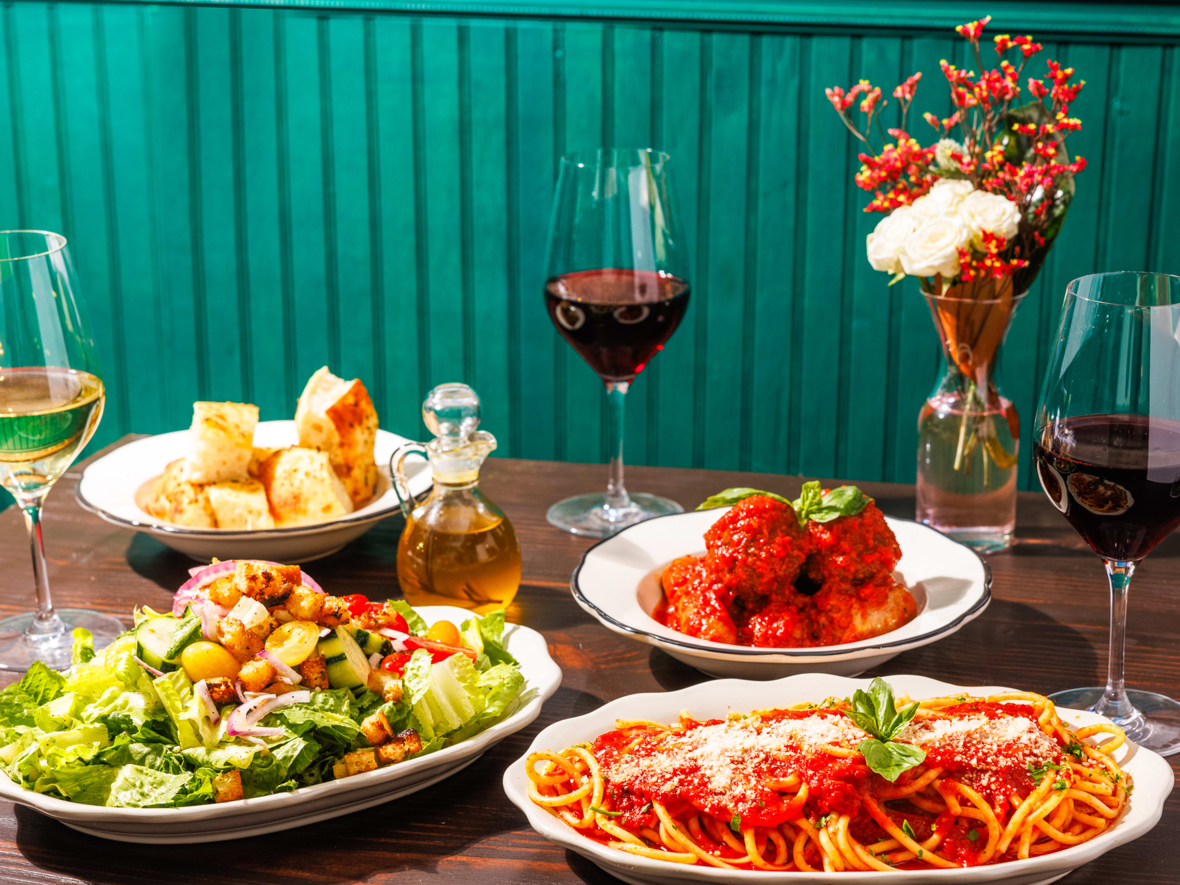 A spread of dishes at City Island Pizza Company.