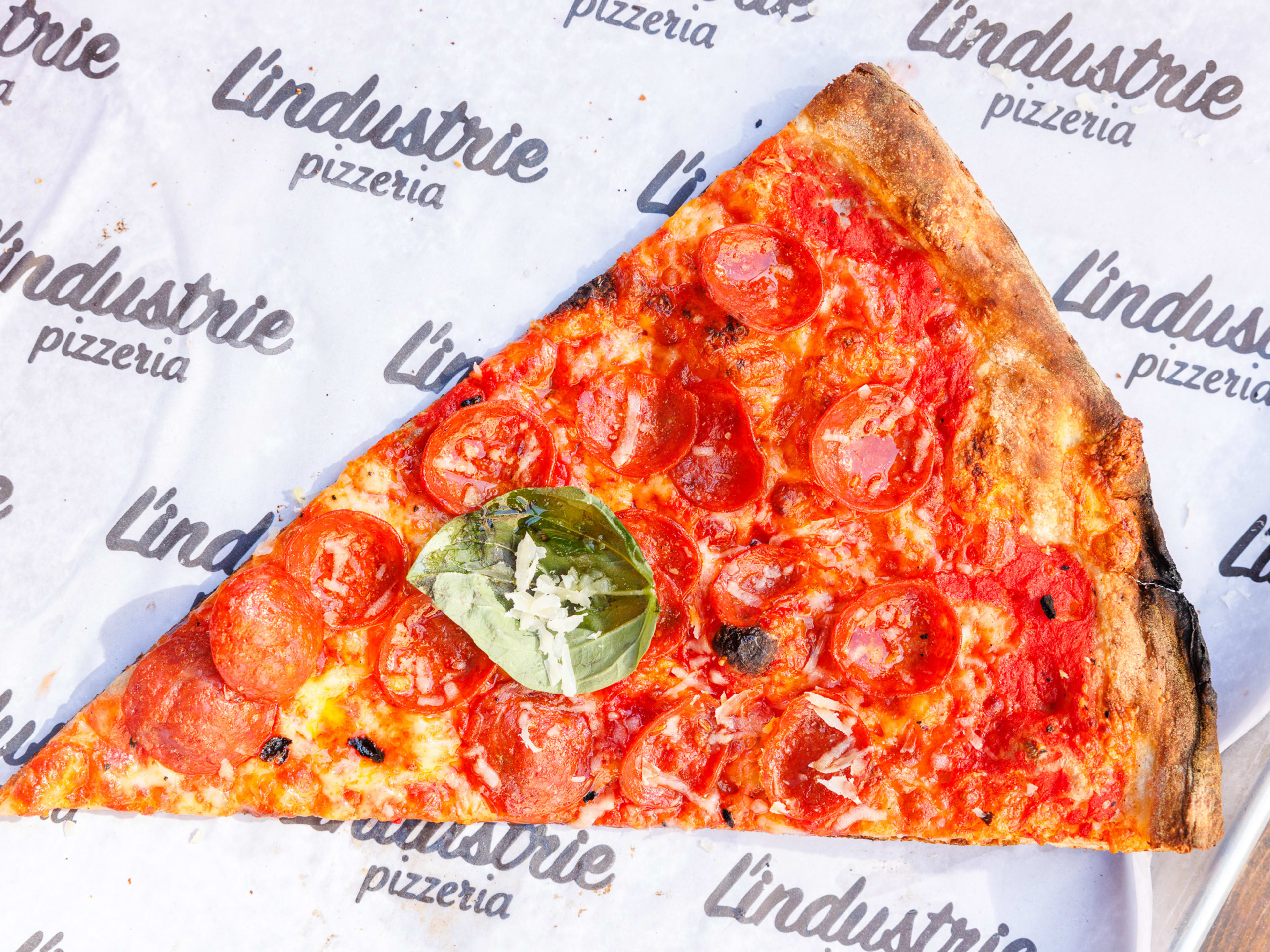 a slice of pepperoni pizza from L'Industrie in the West Village