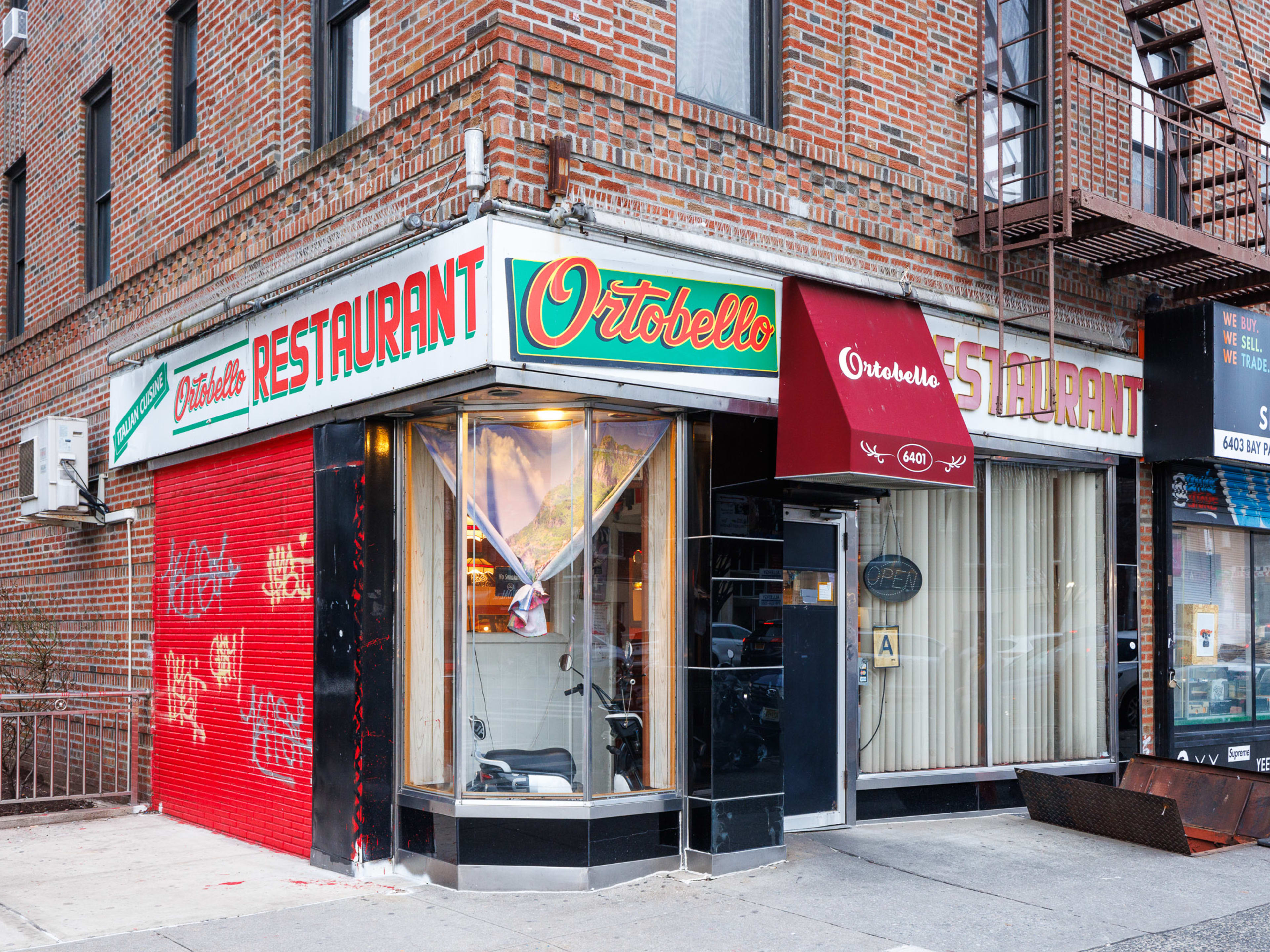 The green and red accented exterior of Ortobello's.