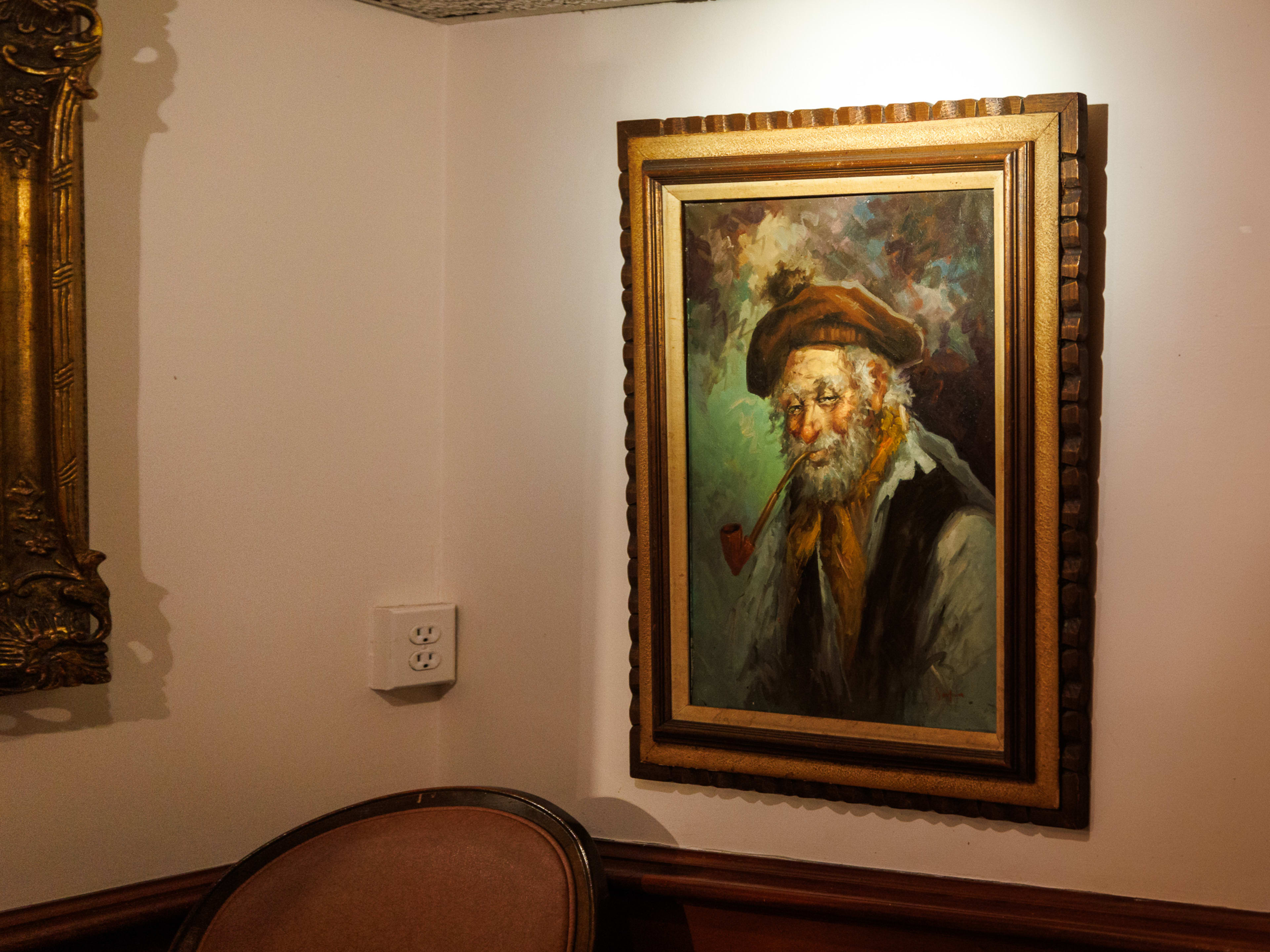 A painting hung on the wall at Villa Mosconi.