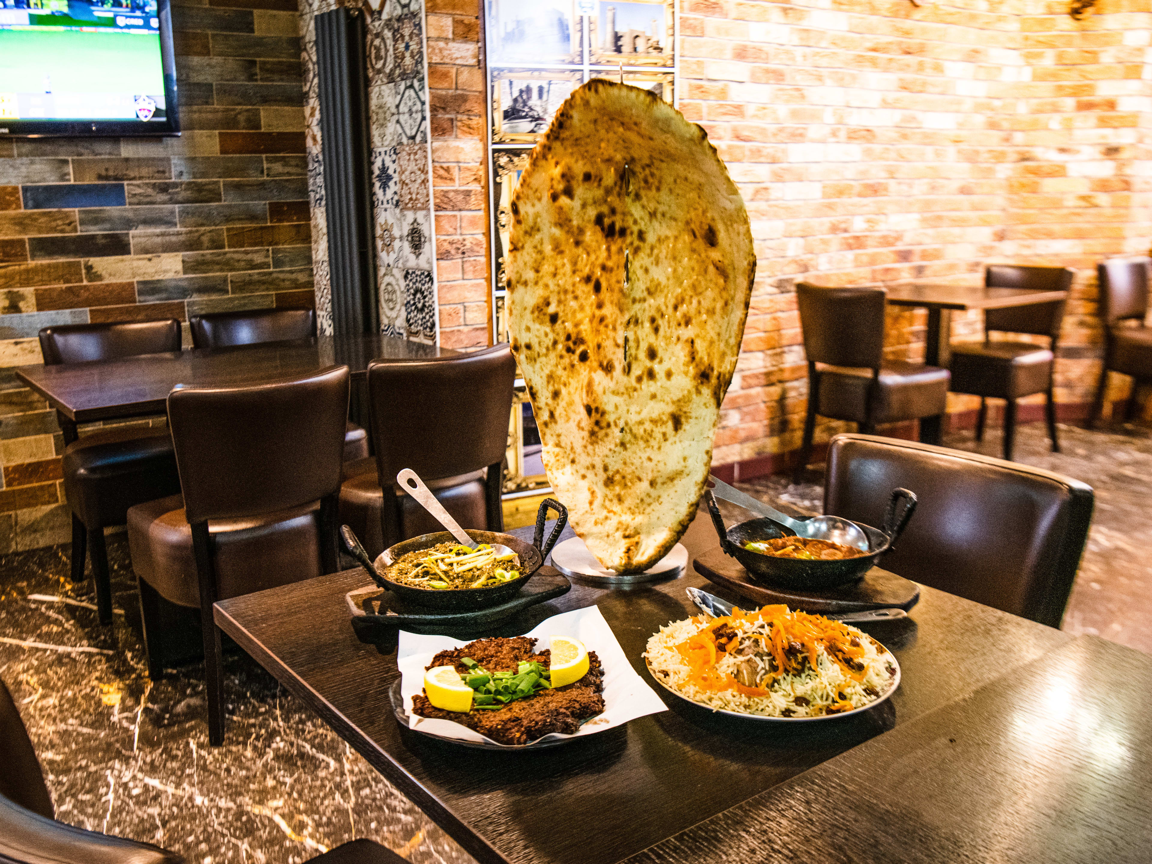 A spread of food at Namak Mandi