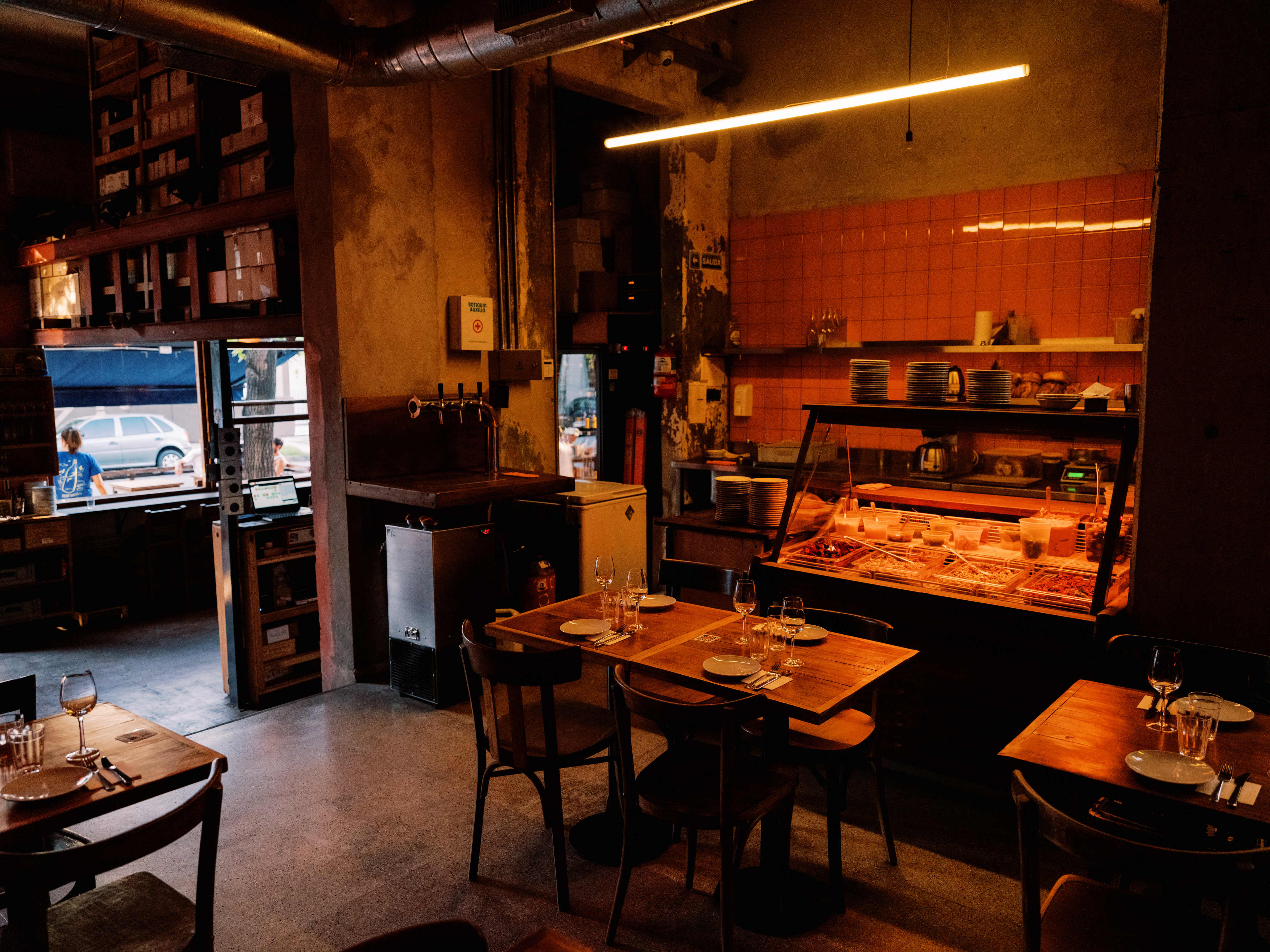 Interior seating area at Naranjo Bar.