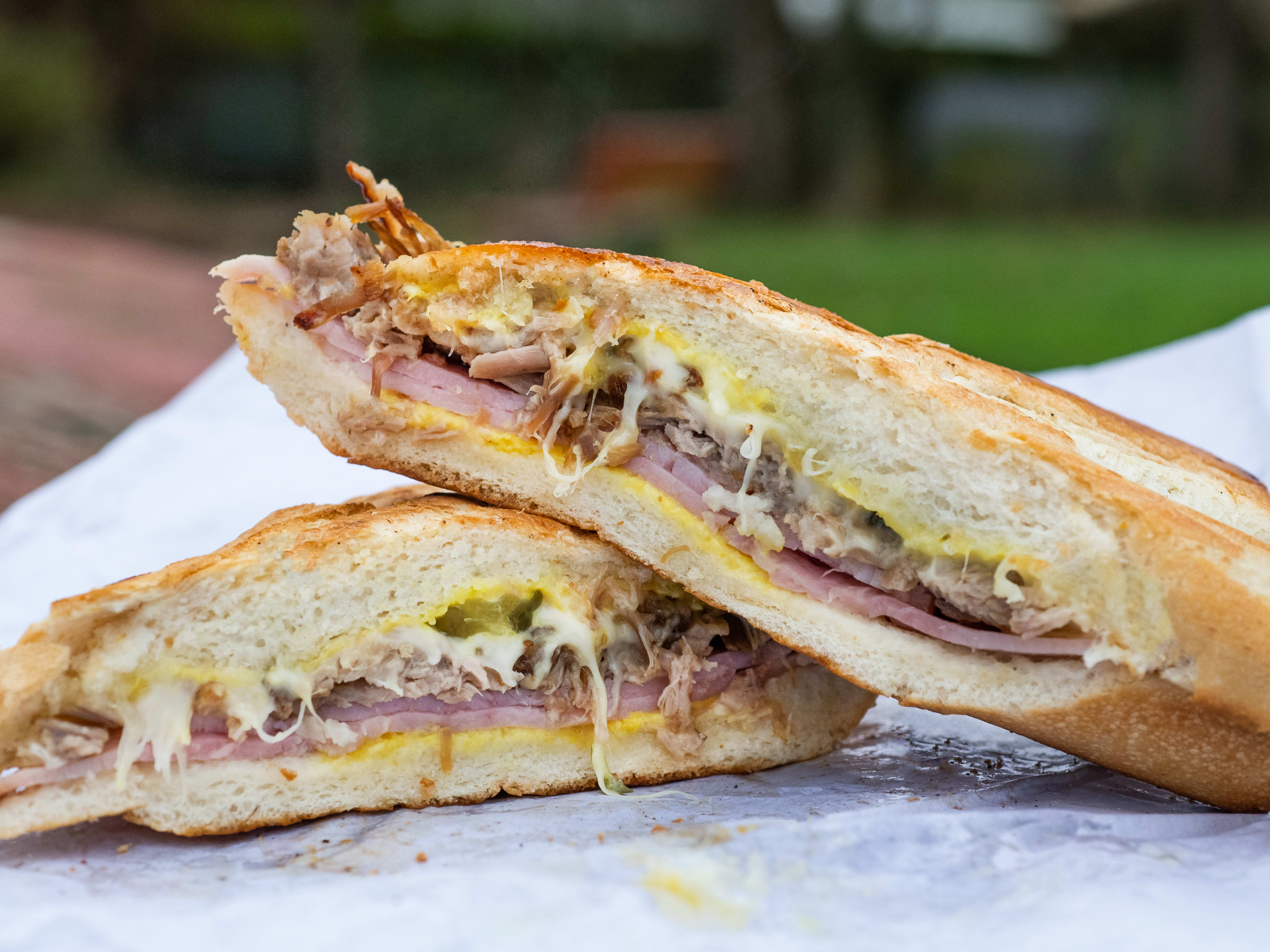 Pressed Cuban sandwich with ham, cheese, and mustard