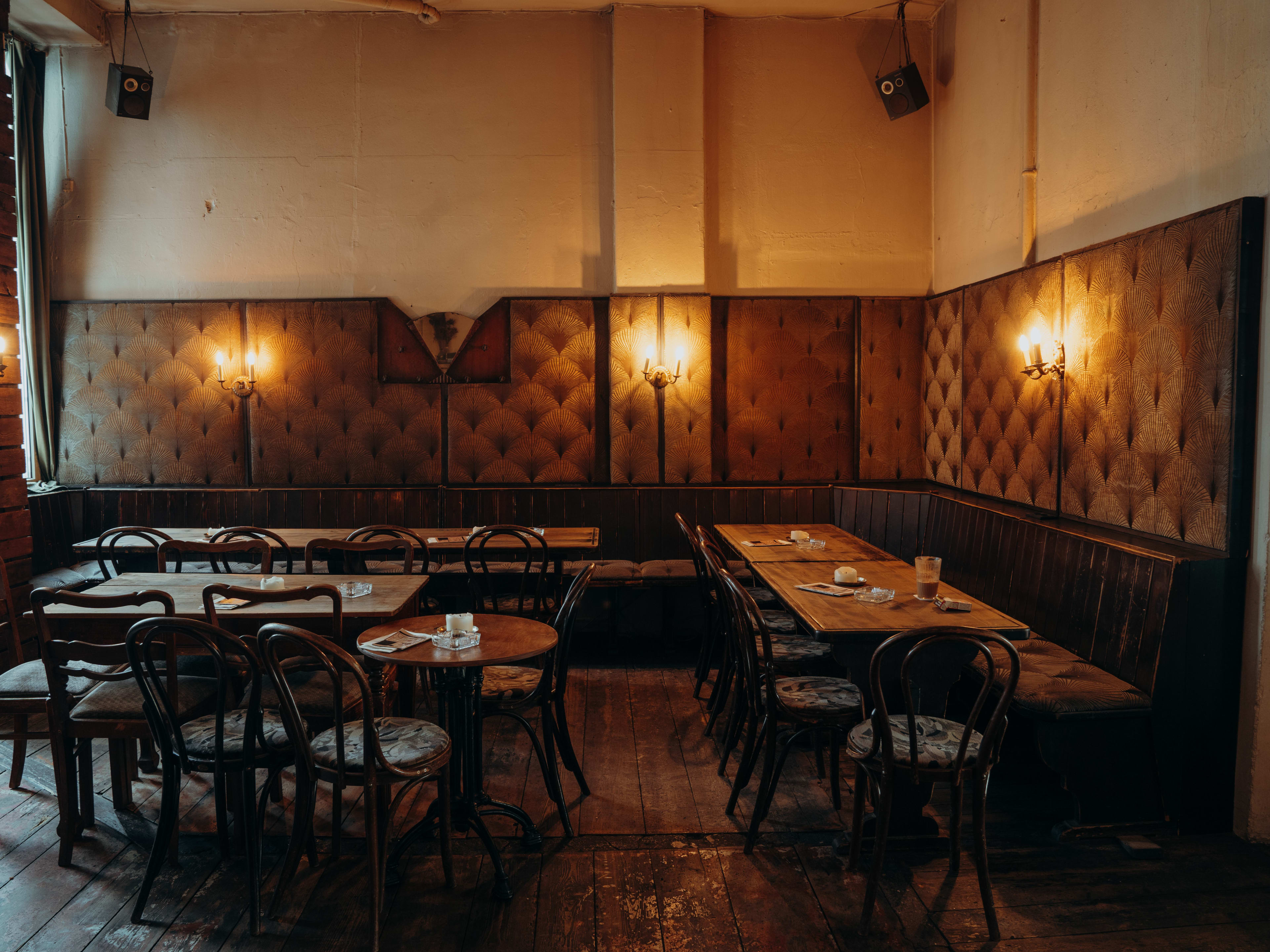 Interior dining space in dim lighting at Nathanja & Heinrich