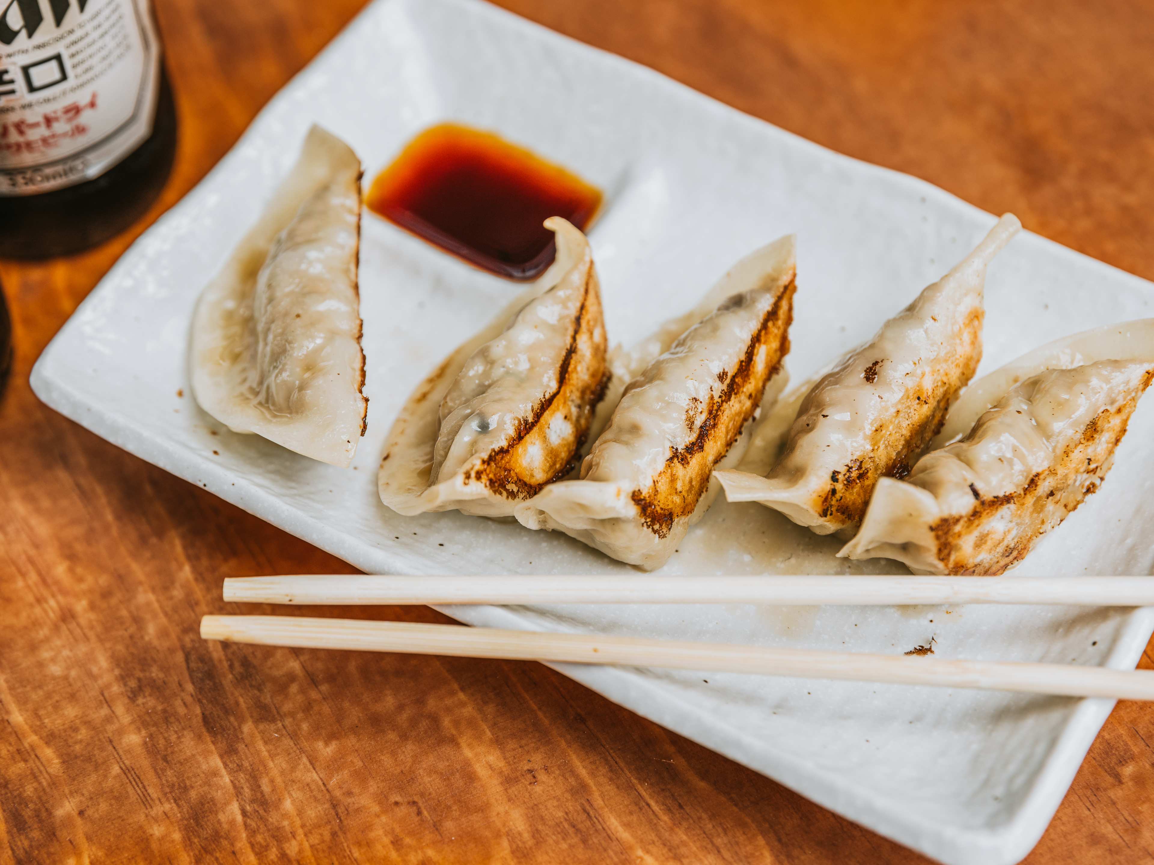 Fried dumplings with dipping sauce at Niko Niko Ramen