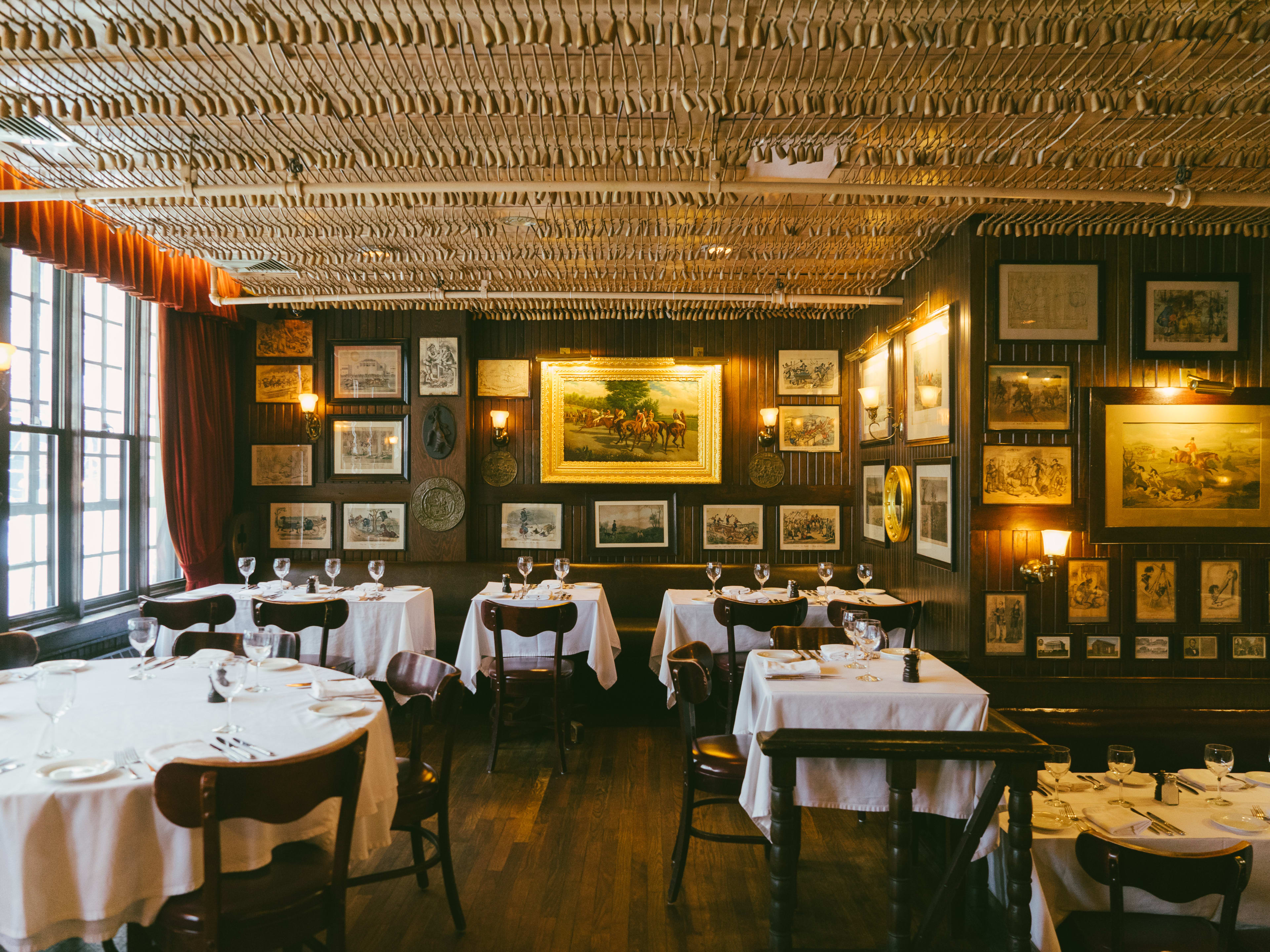 The dining room at Keens Steakhouse.