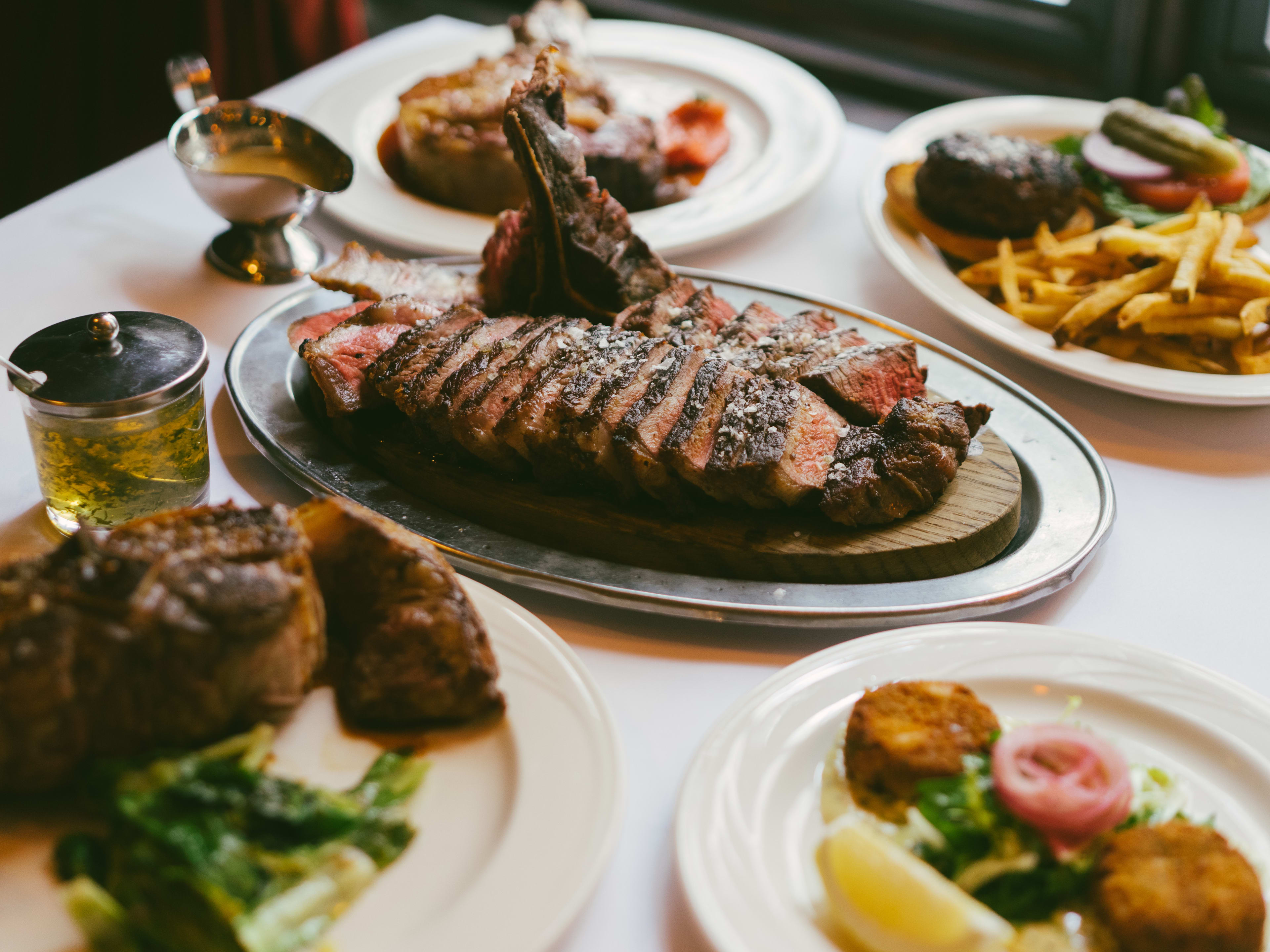 A spread of dishes from Keens Steakhouse.