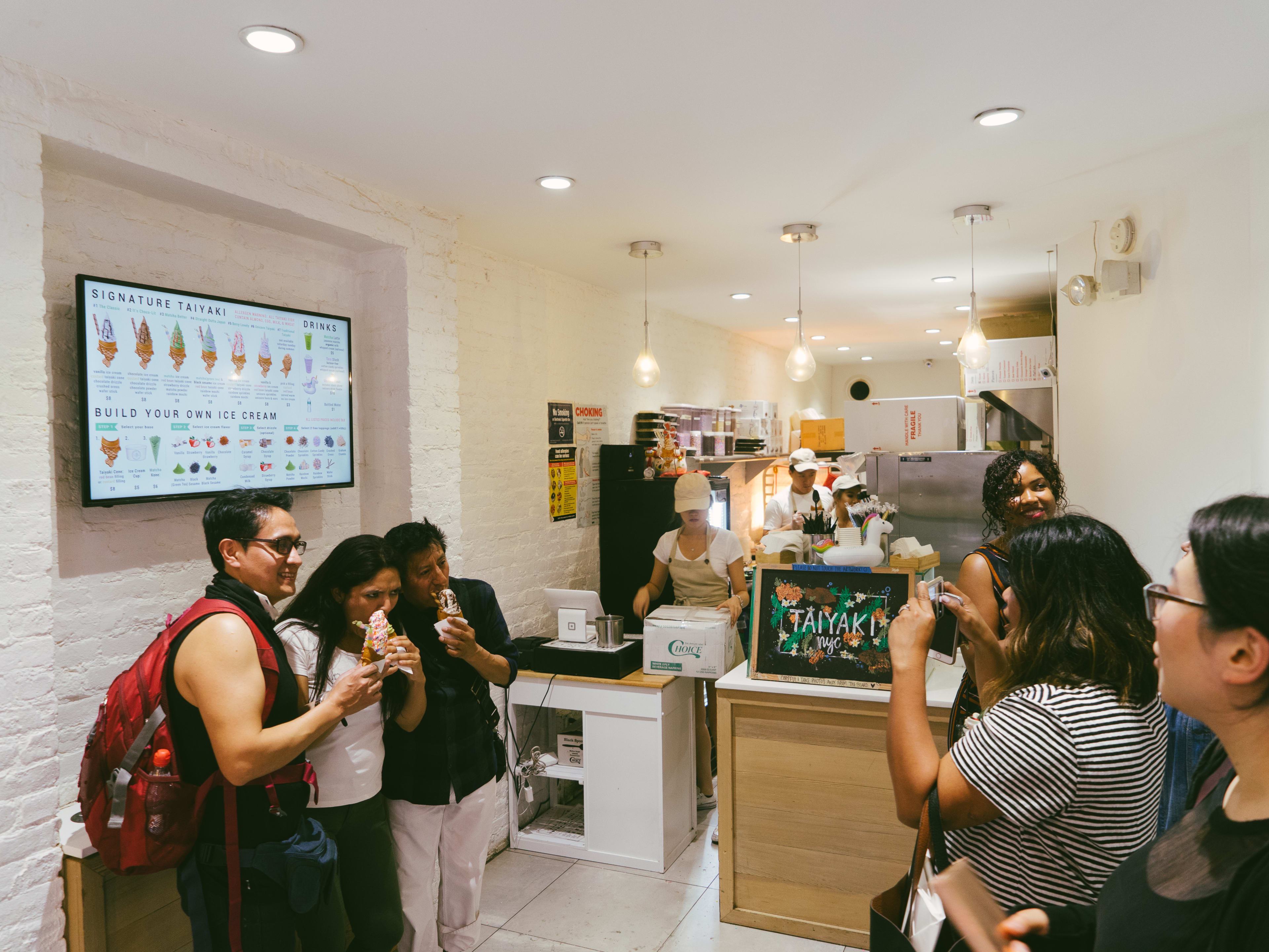 People take pictures with their ice cream inside Taiyaki.