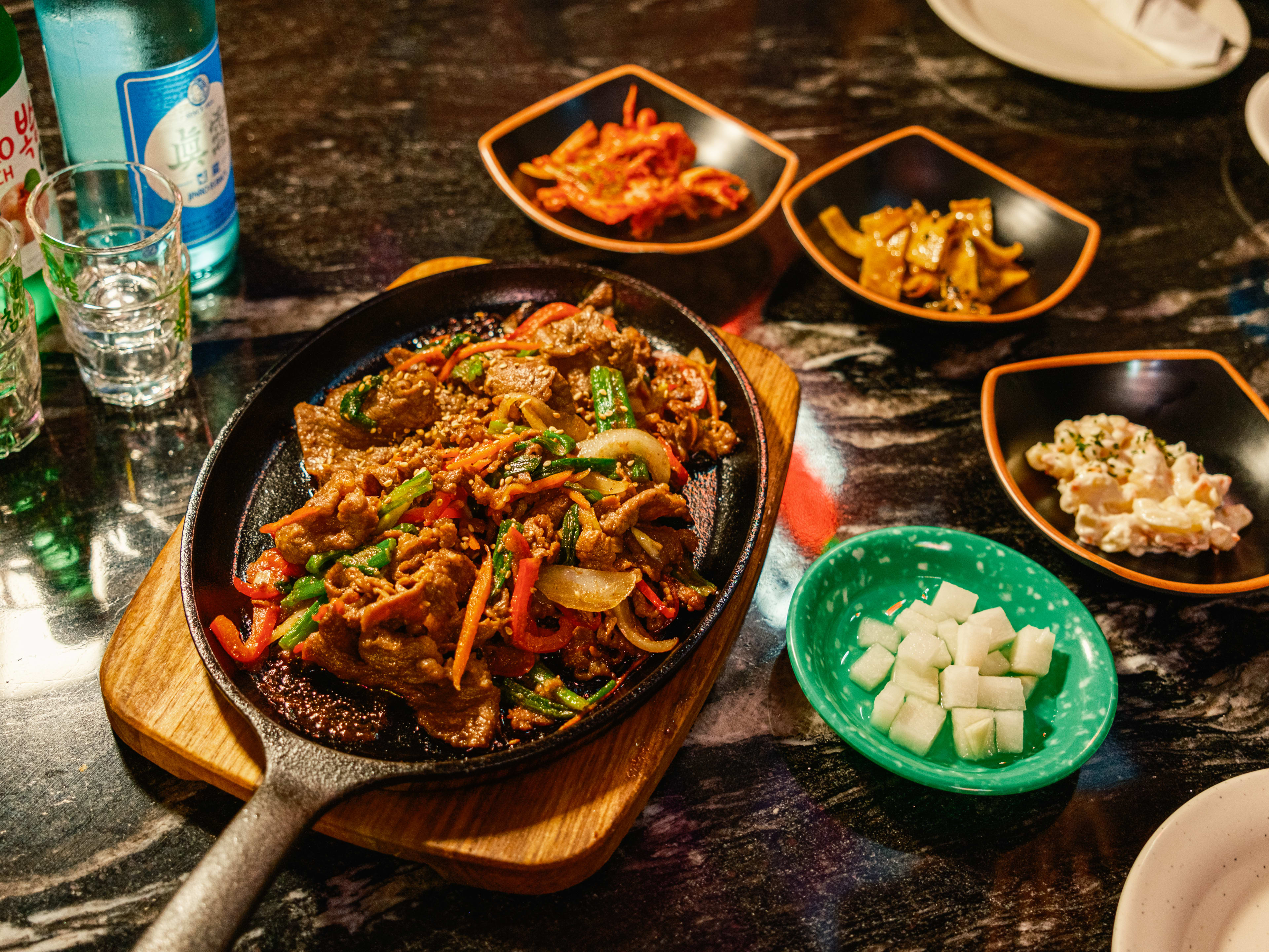 bulgogi beef and assorted banchan dishes