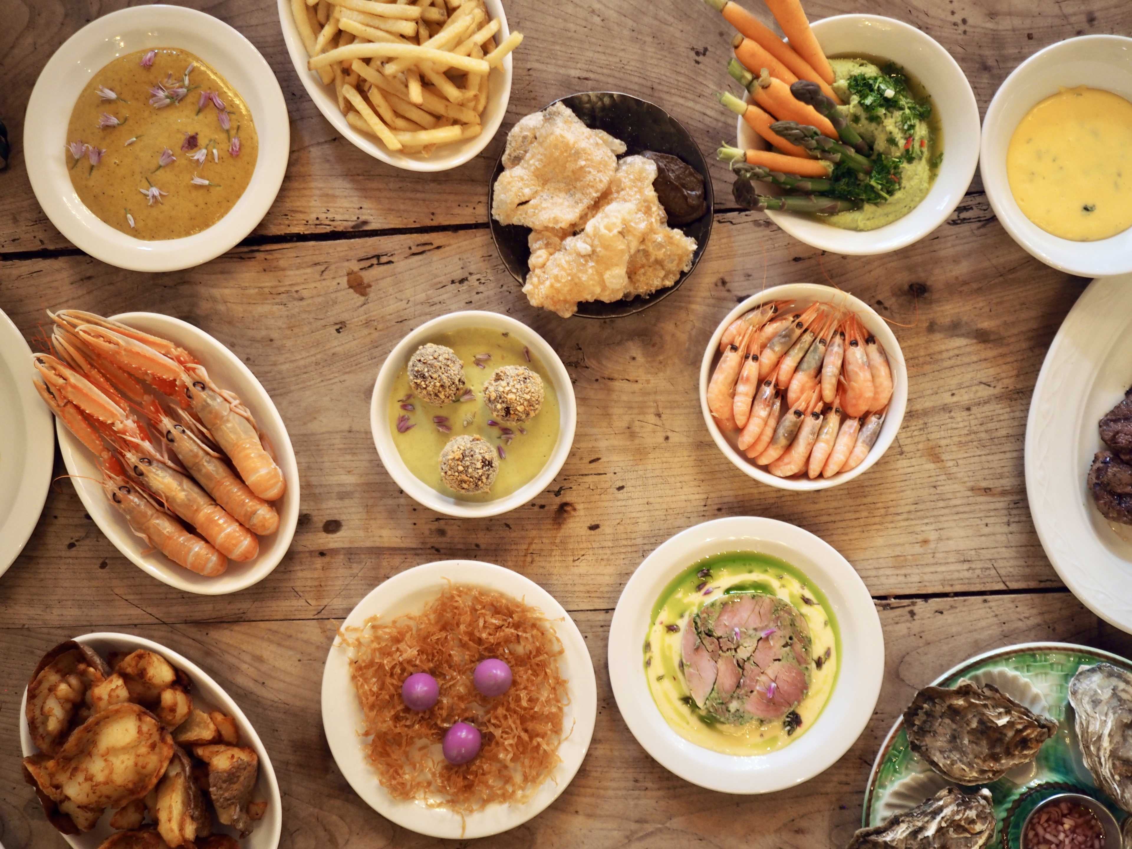 A spread of dishes at The Pig's Ear.