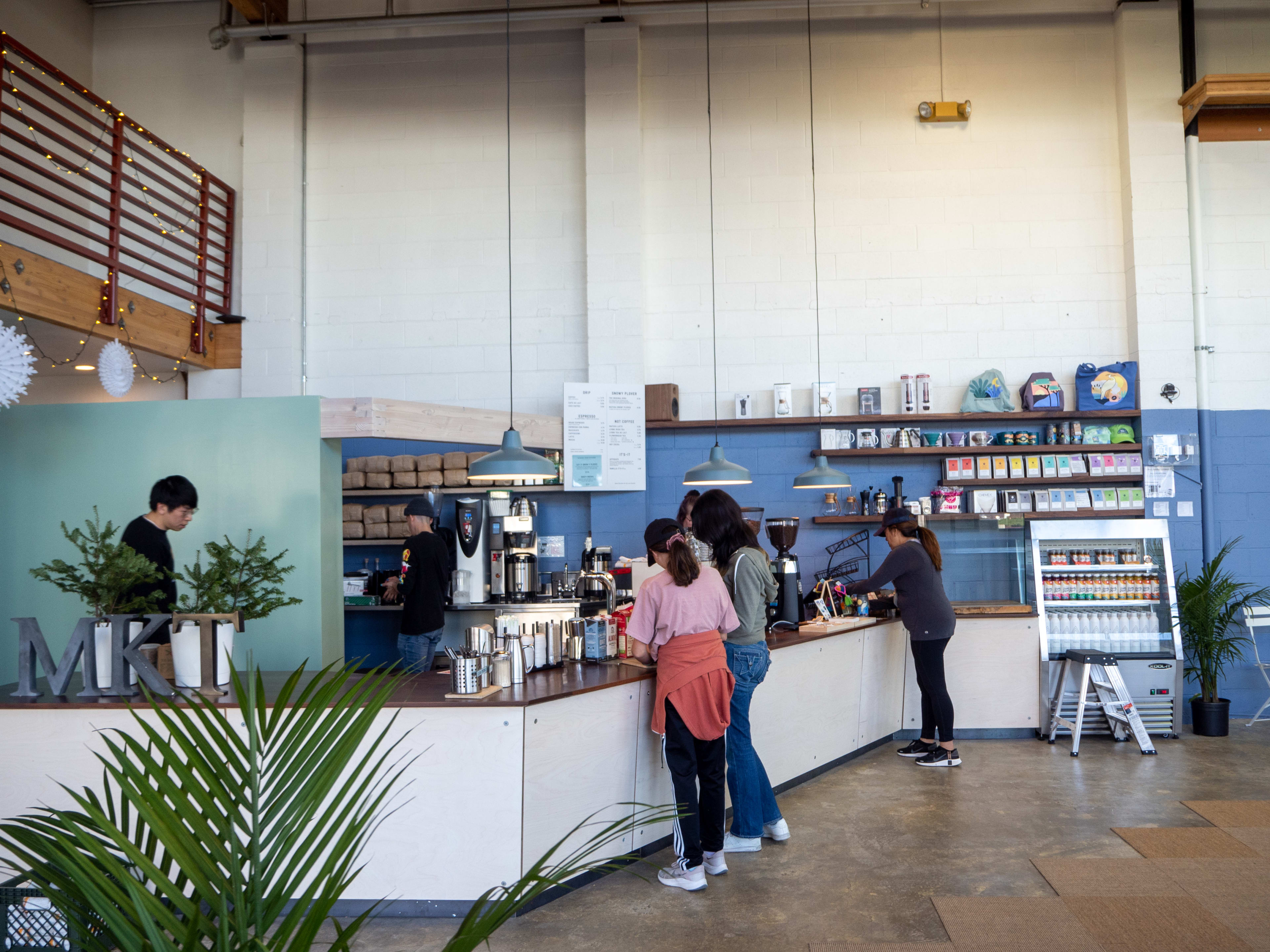 Folks ordering coffee at the counter at Andytown