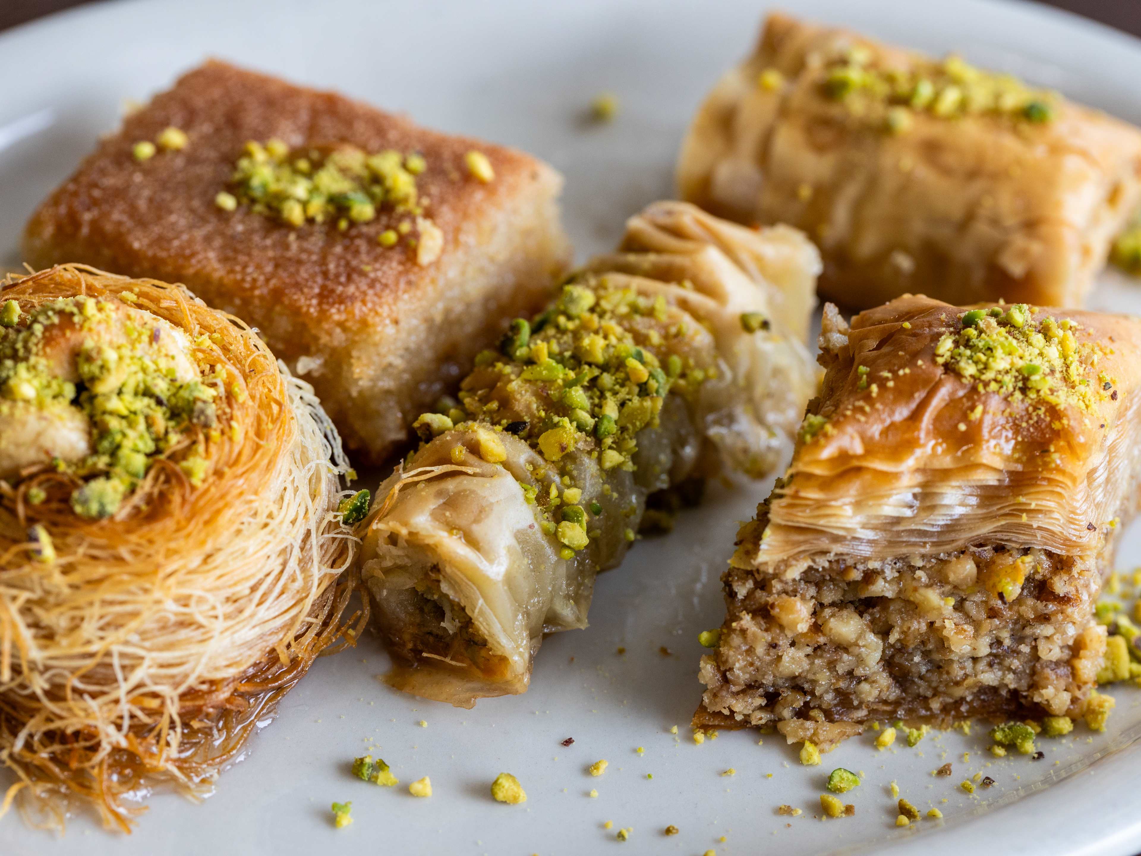 The bird's next baklava, pistachio, walnut, cashew baklava, and harayra from Peace Bakery.