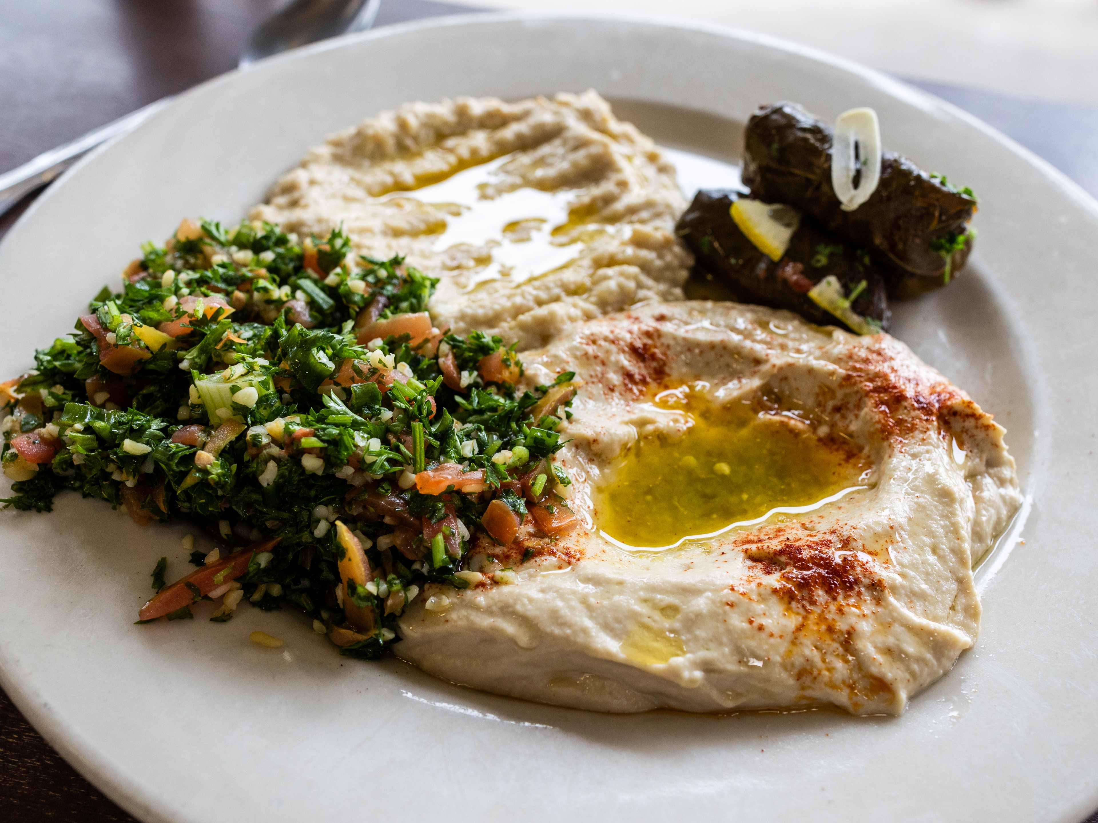 The hummus, babagajouj, tabouli, and dolmas from Peace Bakery.