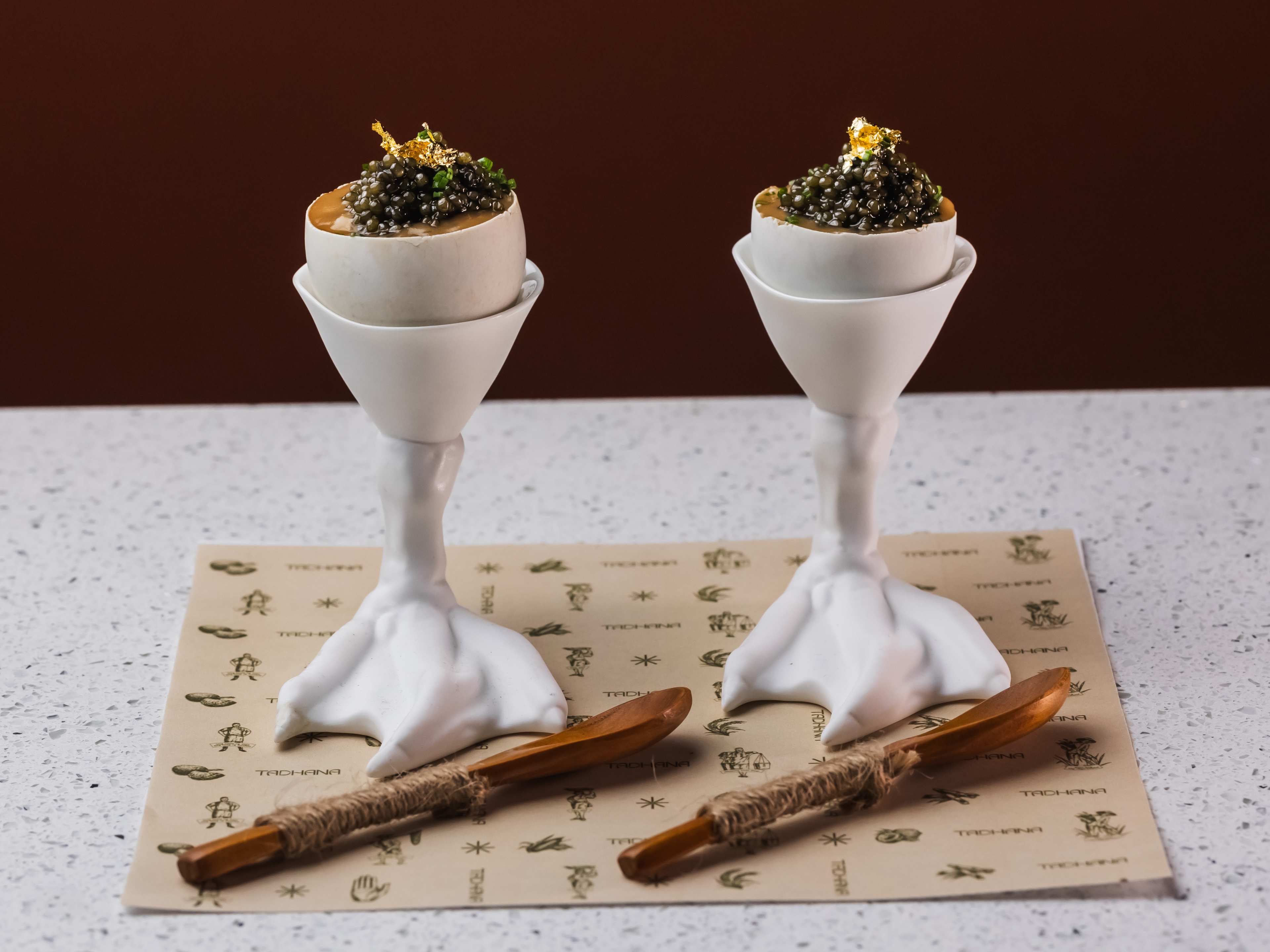 two duck egg chawanmushis in duck-leg shaped goblets with caviar on top