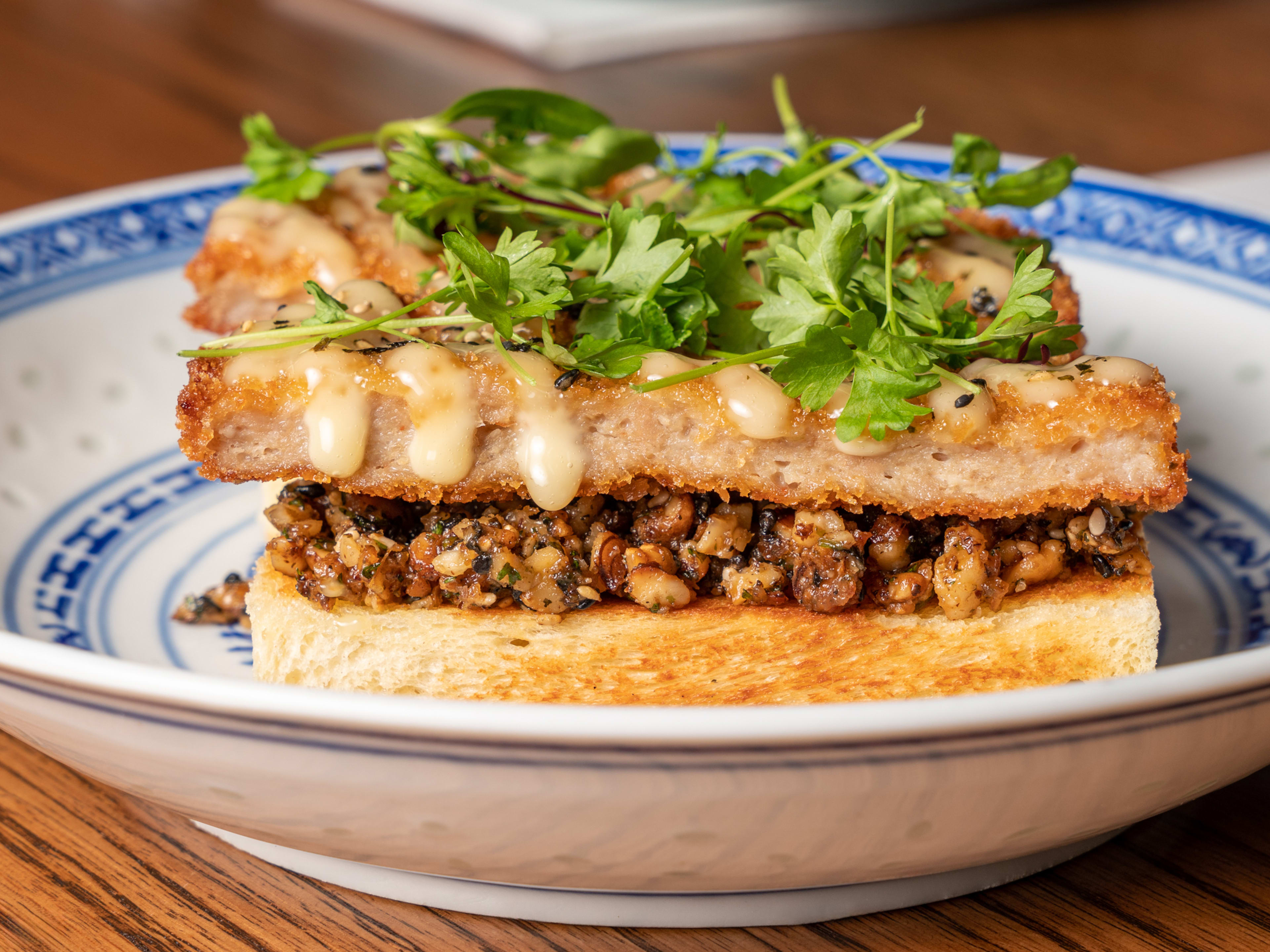 toast with chopped walnuts and breaded shrimp cutlet