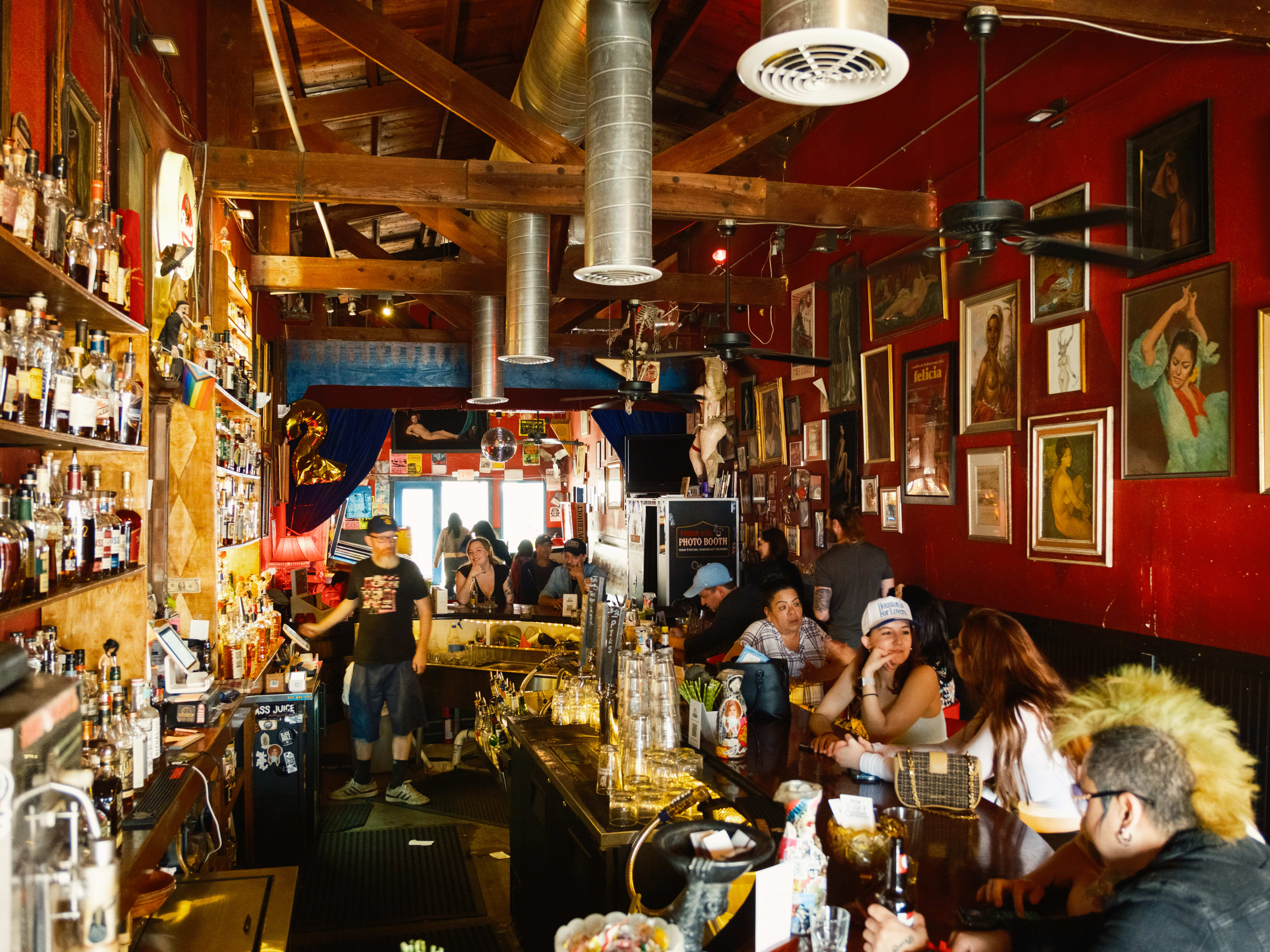 People packed into the bar area at Poison Girl.